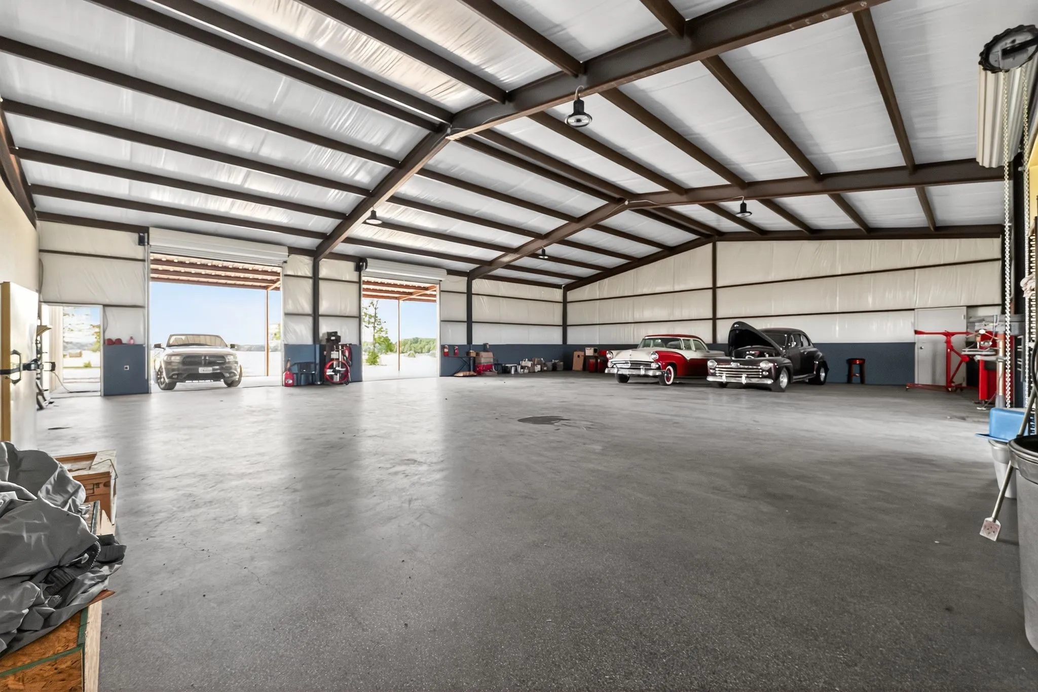 Garage featuring metal wall