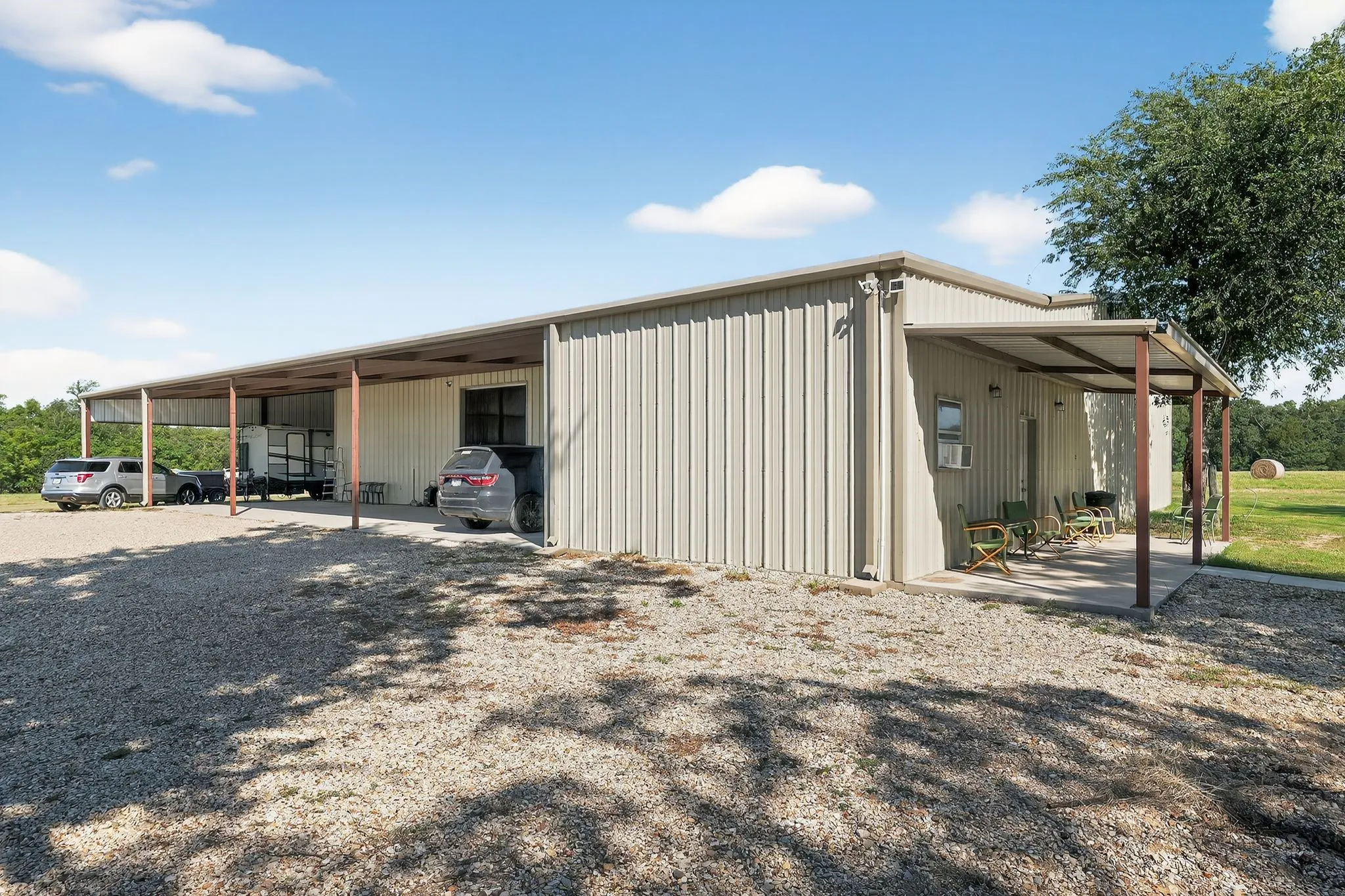 View of outdoor structure featuring a carport