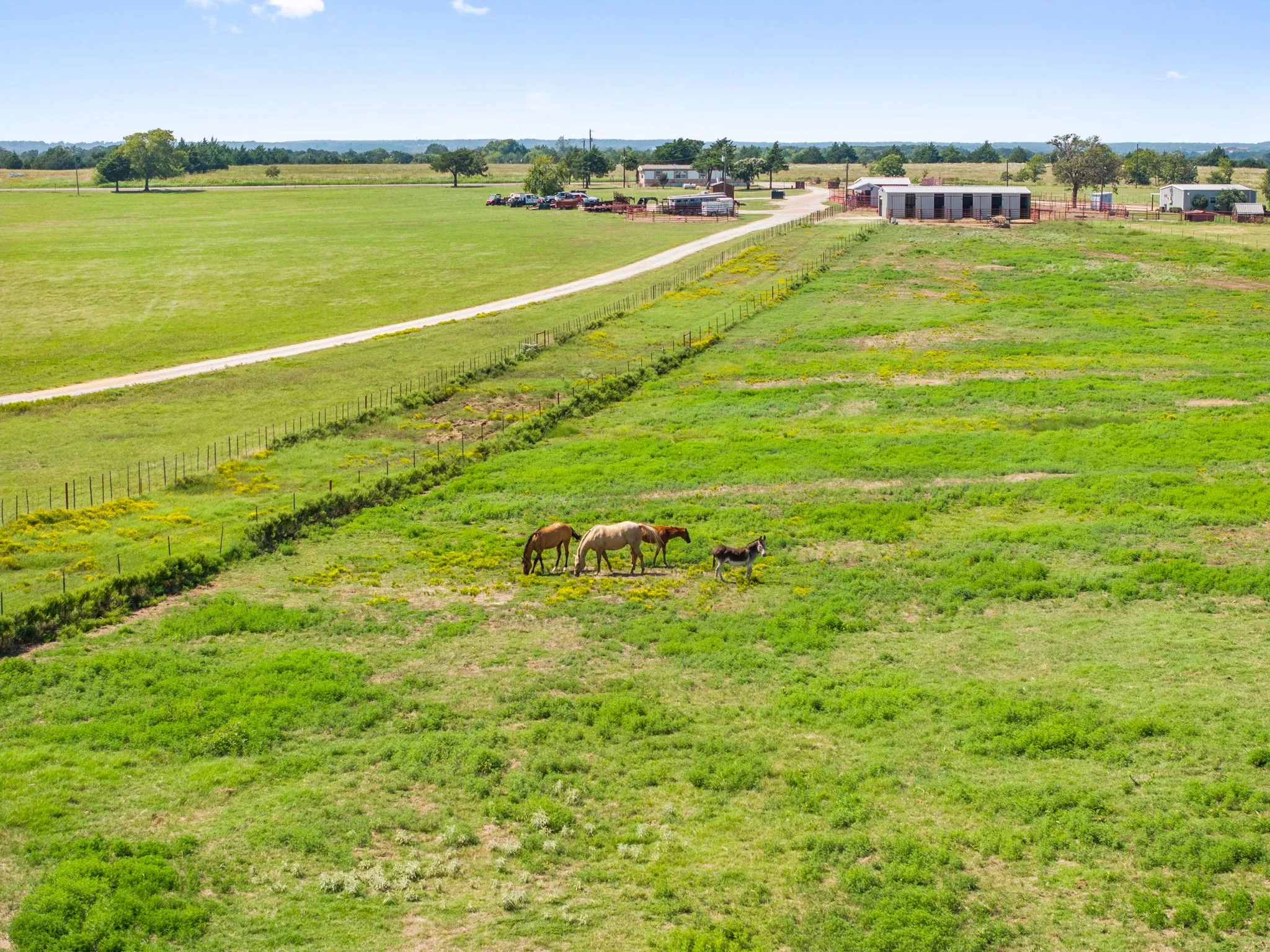 Aerial view of sparsely populated area with agricultural land
