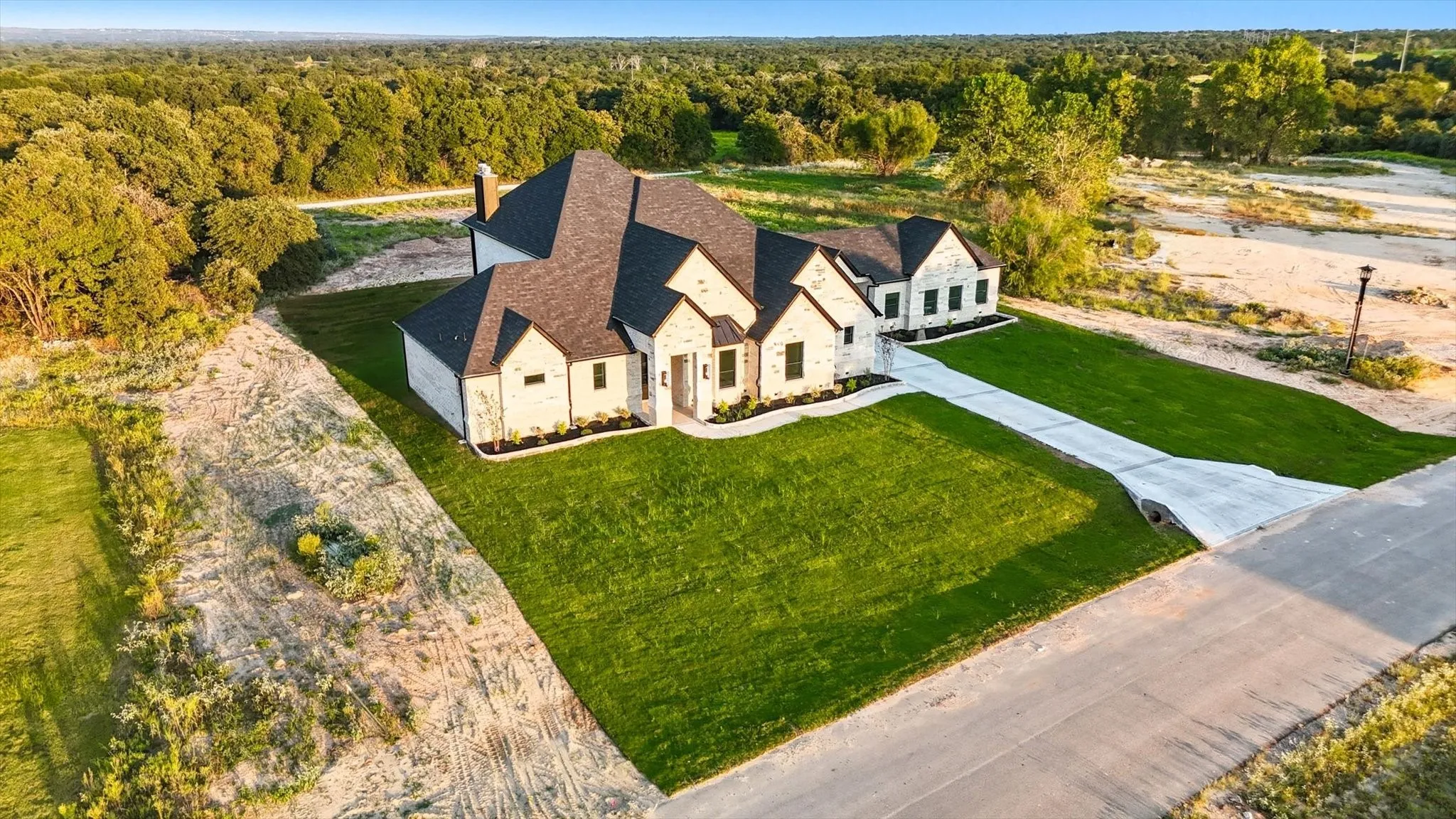 View from above of property with a heavily wooded area
