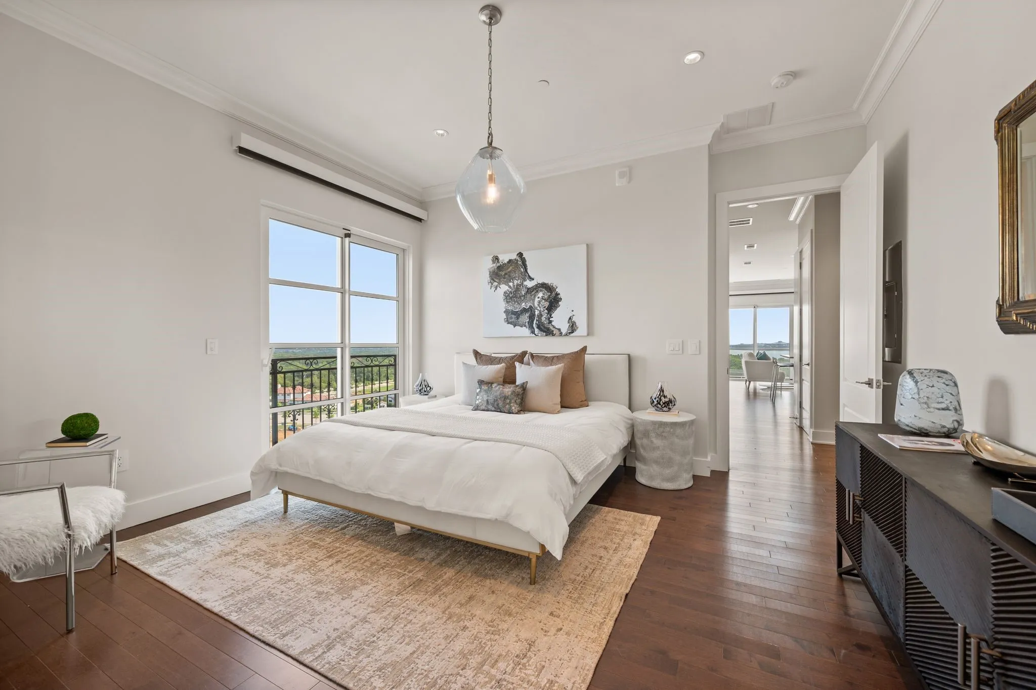 Bedroom featuring ornamental molding, dark wood-type flooring, access to outside, and recessed lighting