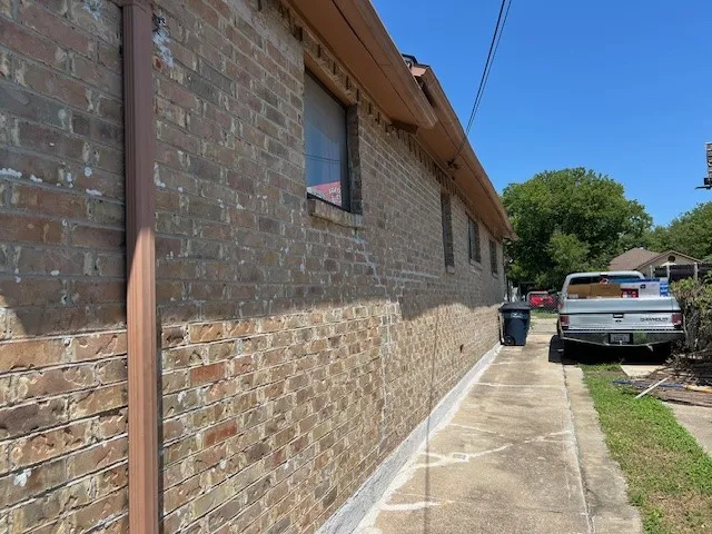 View of home's exterior with brick siding