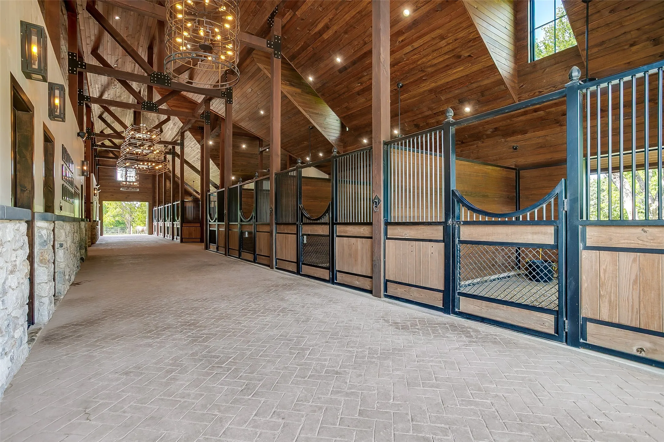 Stamped concrete alleys throughout the barn, crafted for both form and durability.
