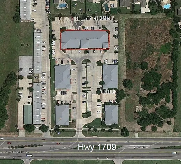 Aerial overview of property's location with property parcel outlined