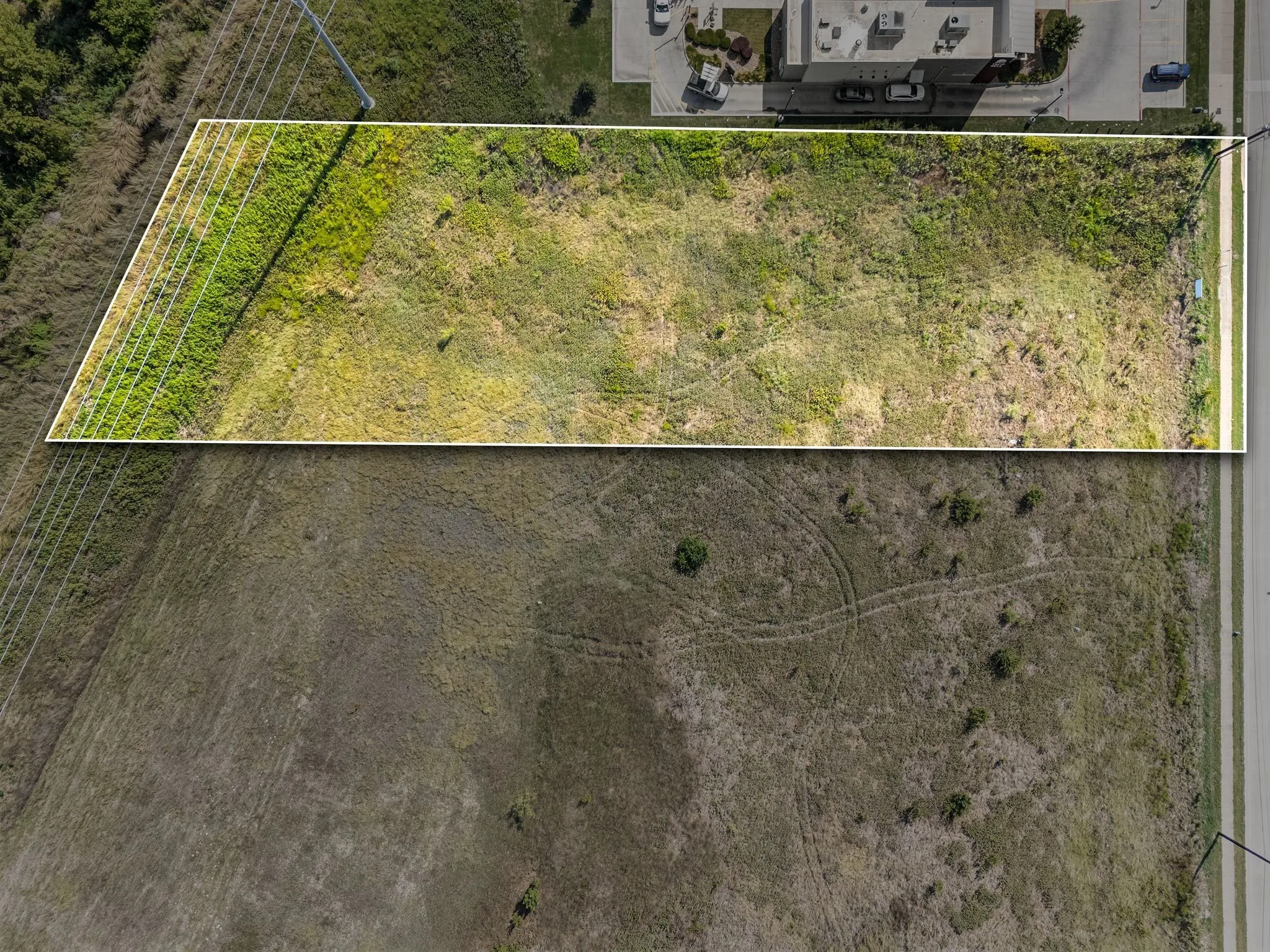 Aerial view of property's location featuring property boundaries highlighted