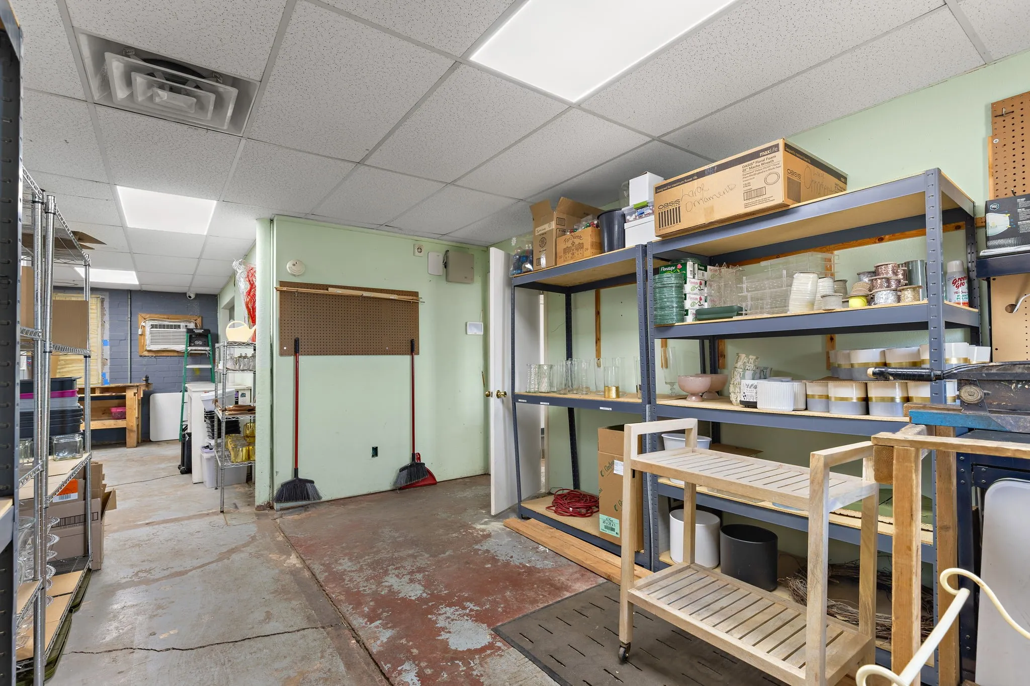 Storage with a wall mounted air conditioner