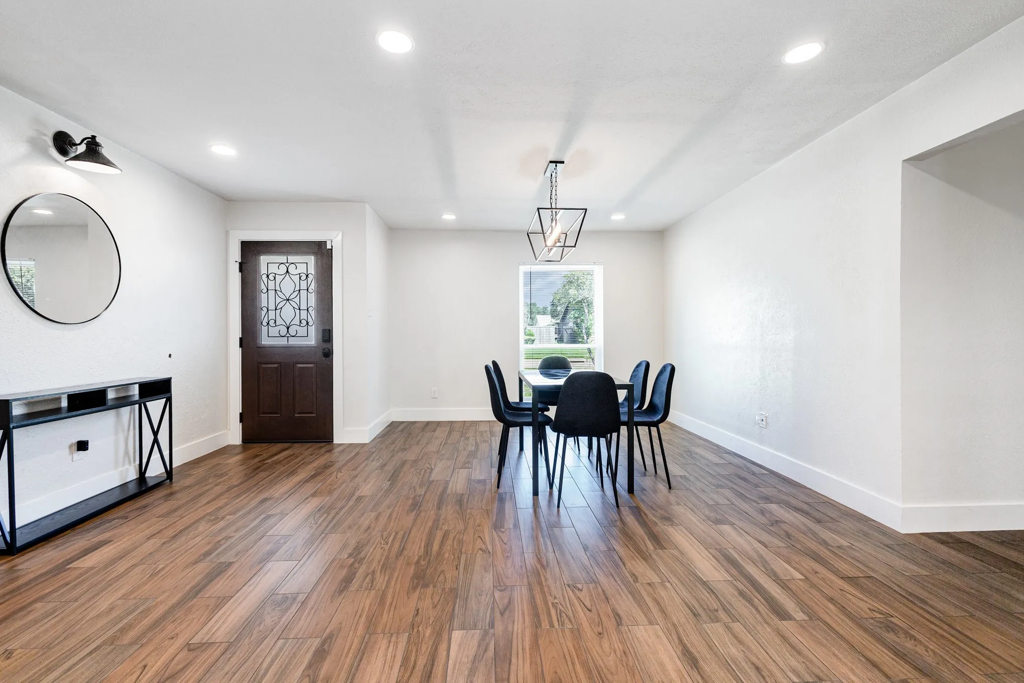 Dining room featuring recessed lighting and dark wood-type flooring