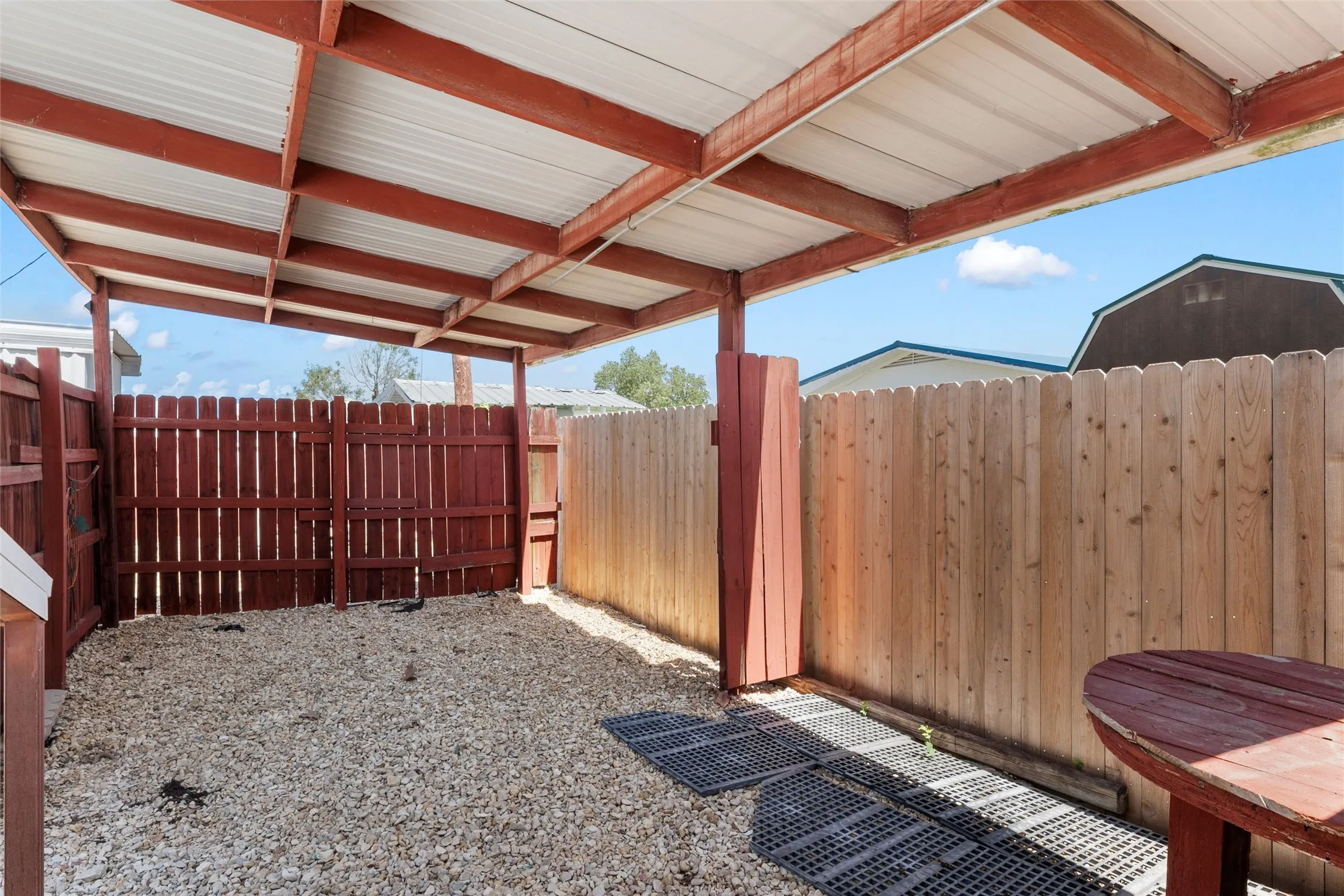 View of fenced backyard