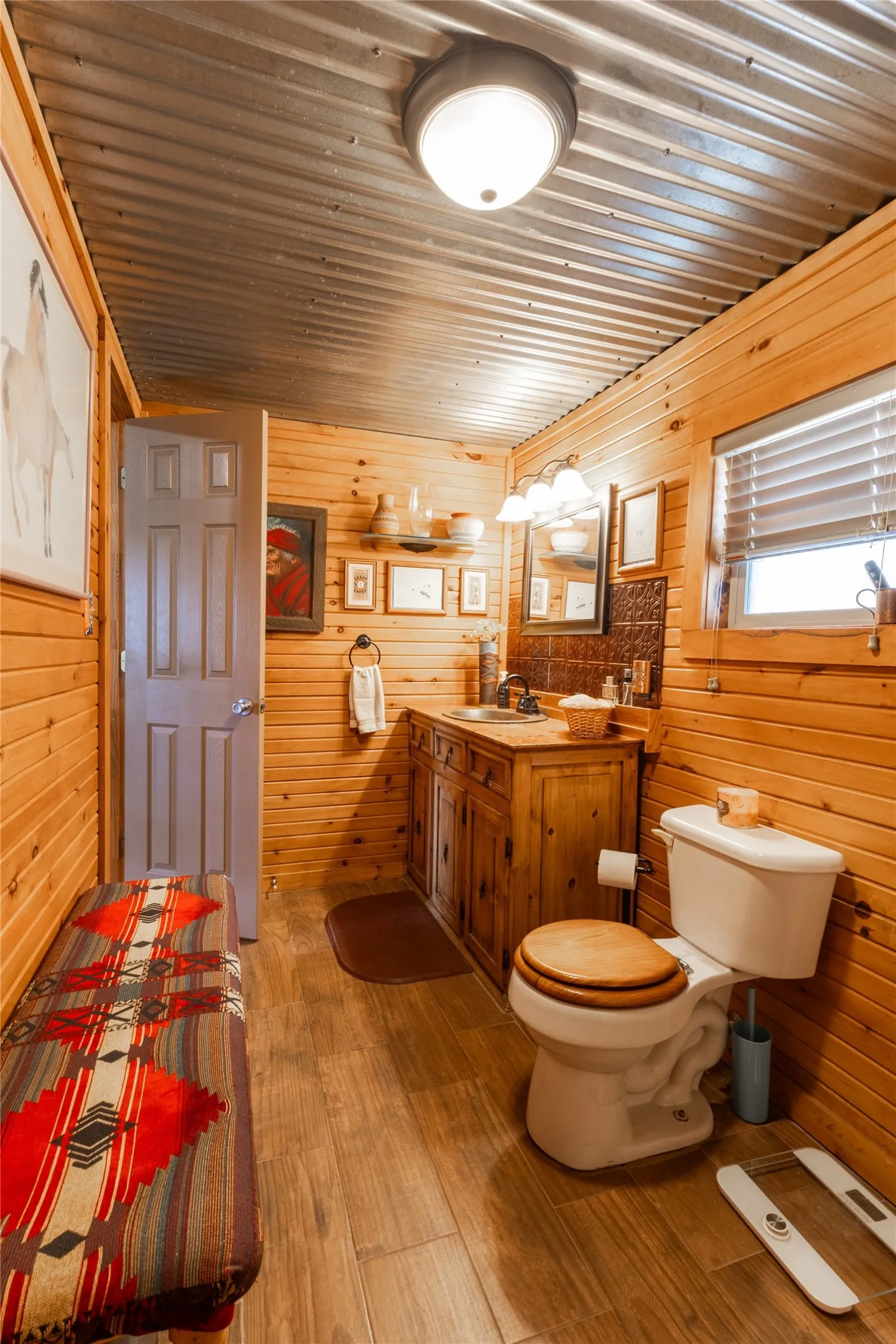 Full view of bathroom and vanity area.