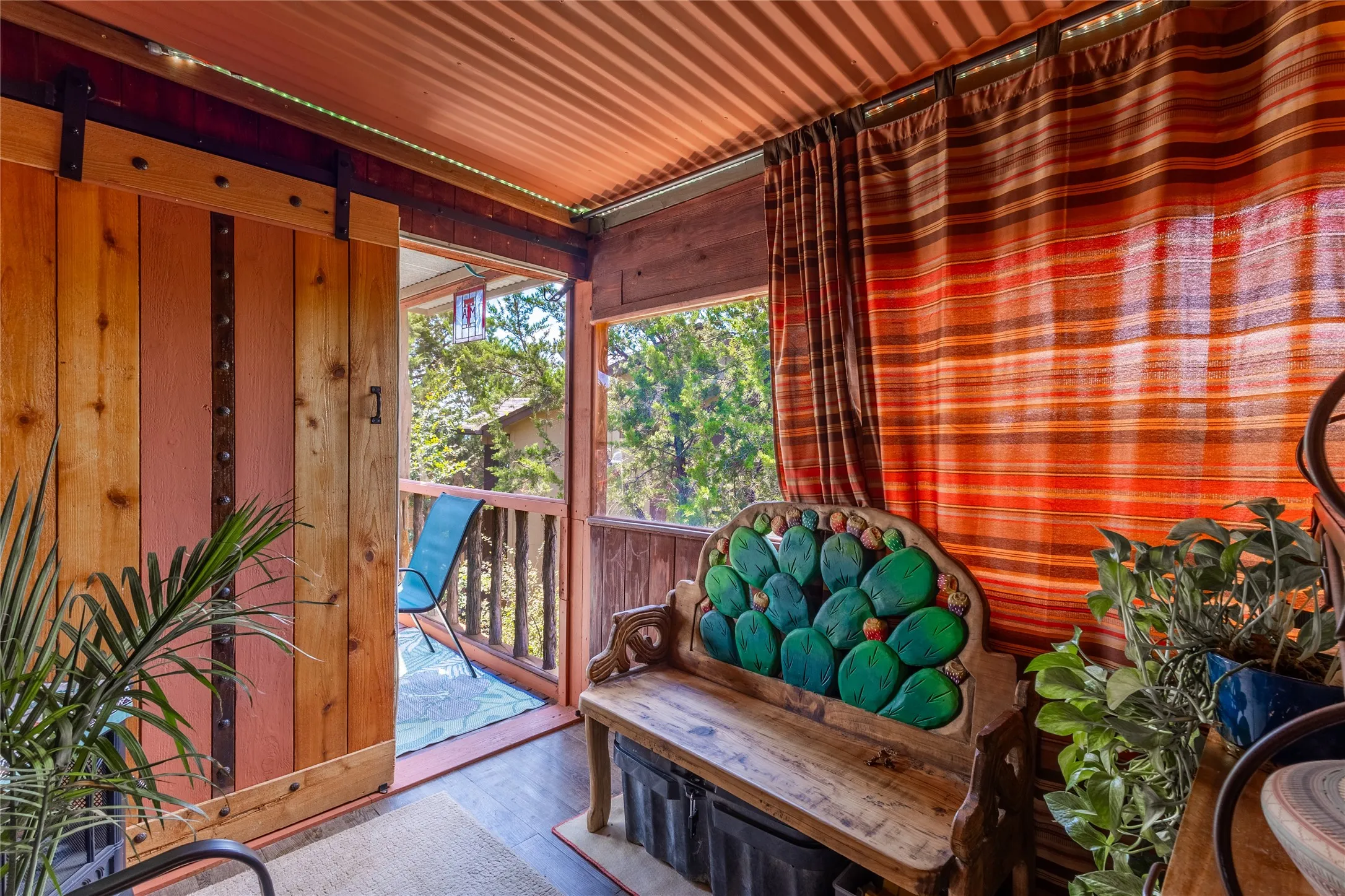 The sunroom also opens to a screened in porch.