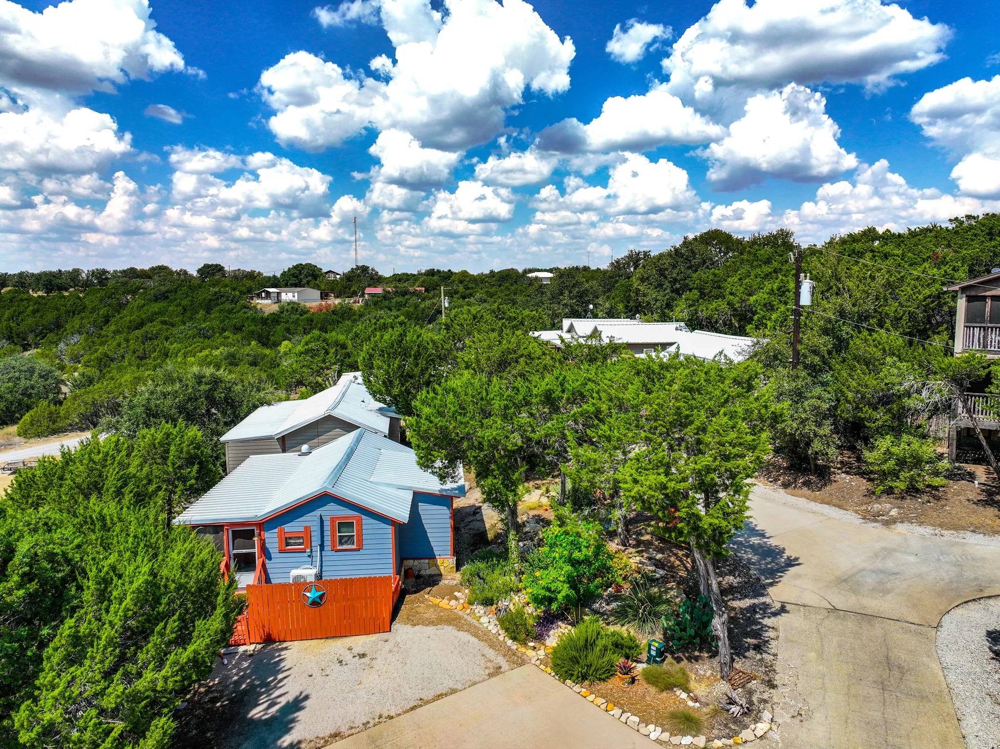 Situated at the top of the drive into The Retreat at Chapel Hill, this charming cabin with it's beautiful garden sitting area is just waiting to be yours!