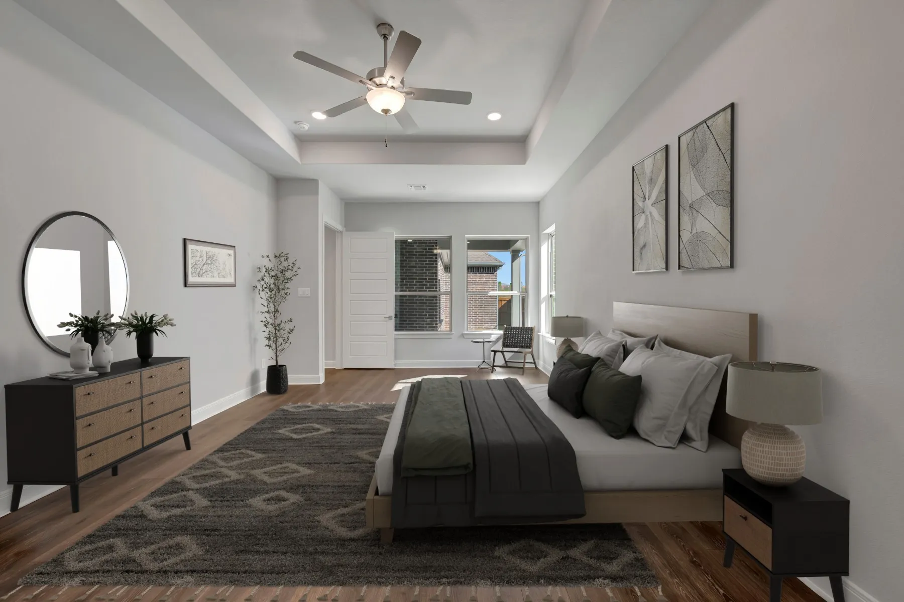 Bedroom with dark wood finished floors, a ceiling fan, a tray ceiling, and recessed lighting