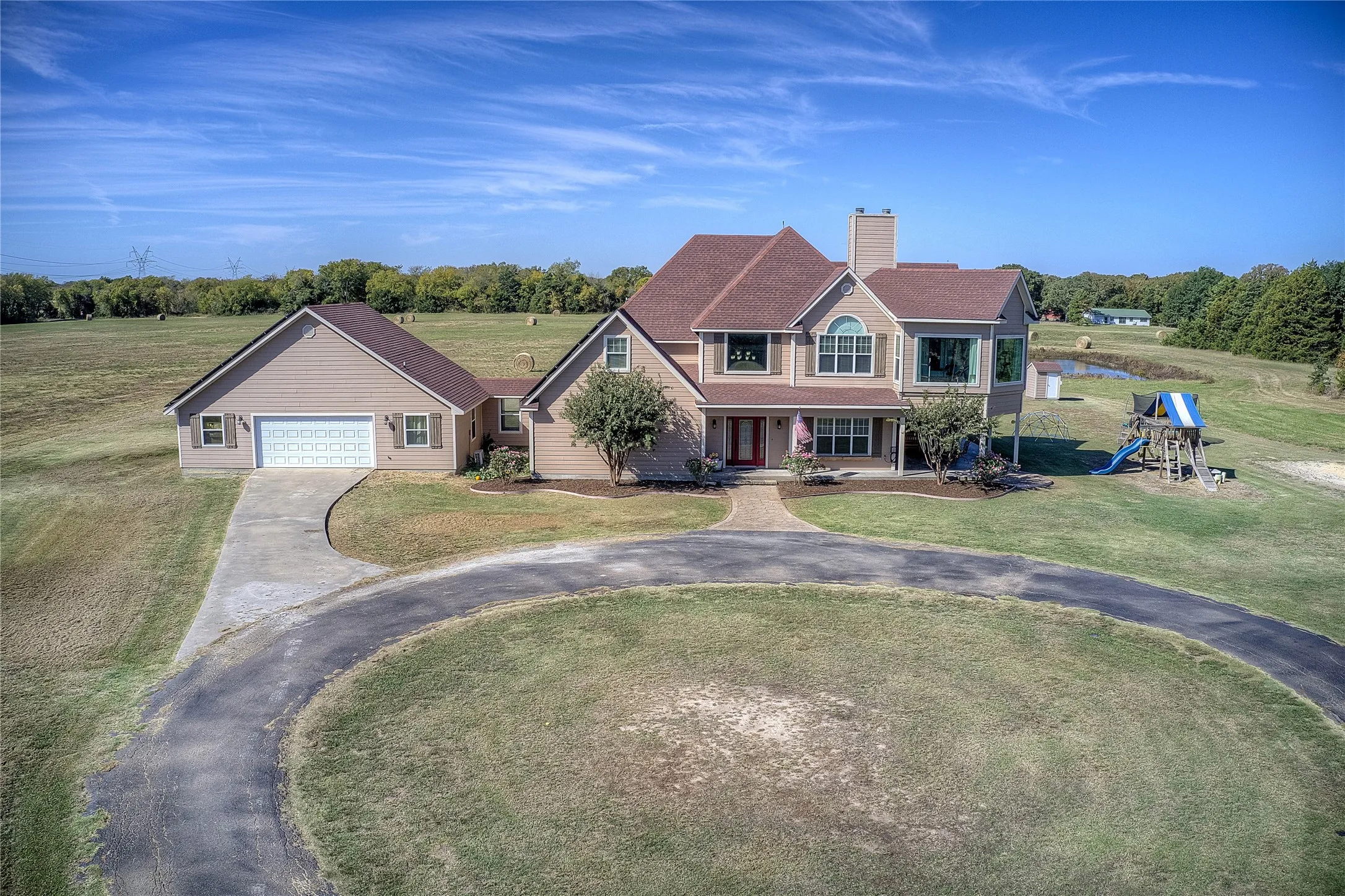 View of front of home featuring a front yard and a porch