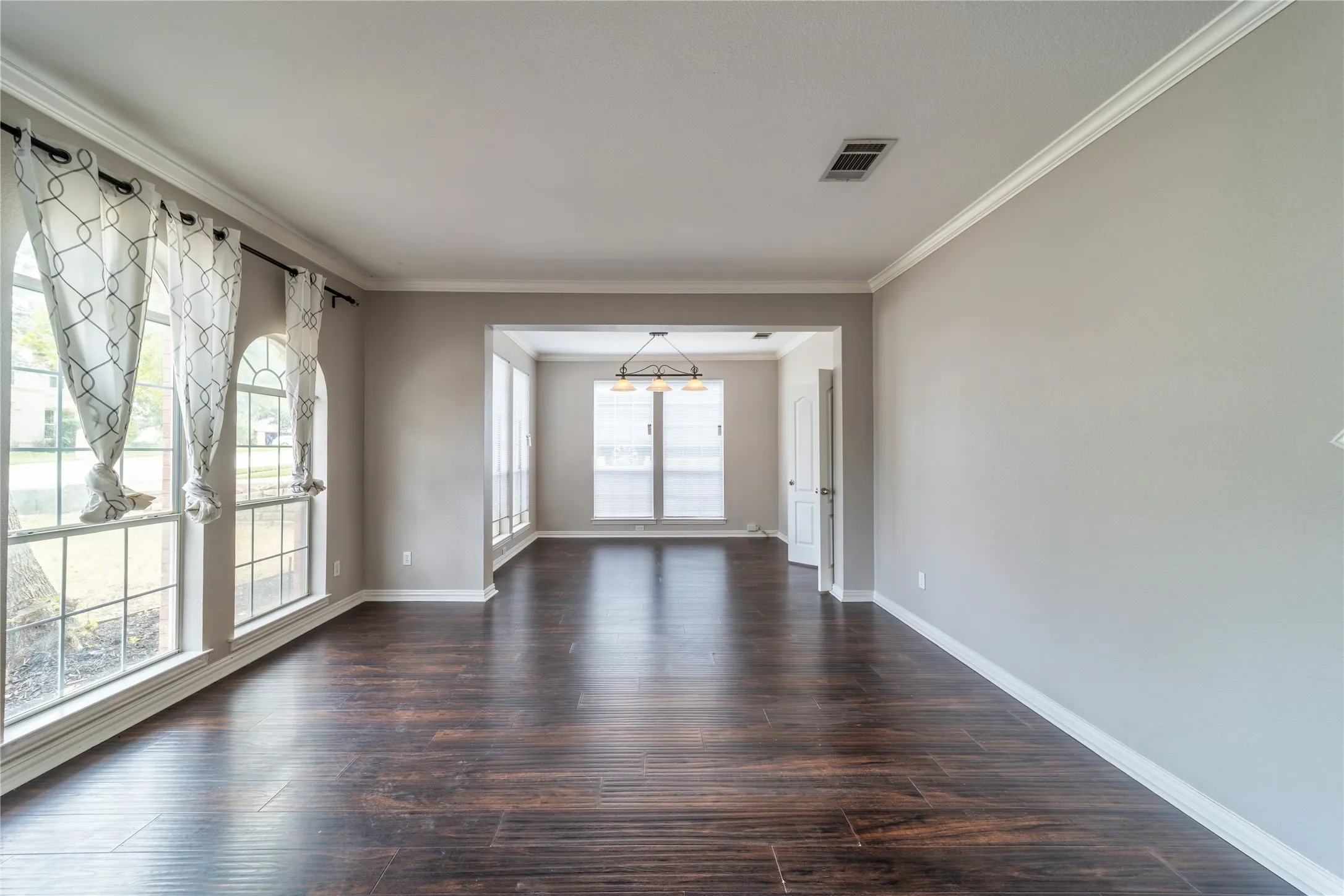 Entering, immediately to the left, second living room with dining room.