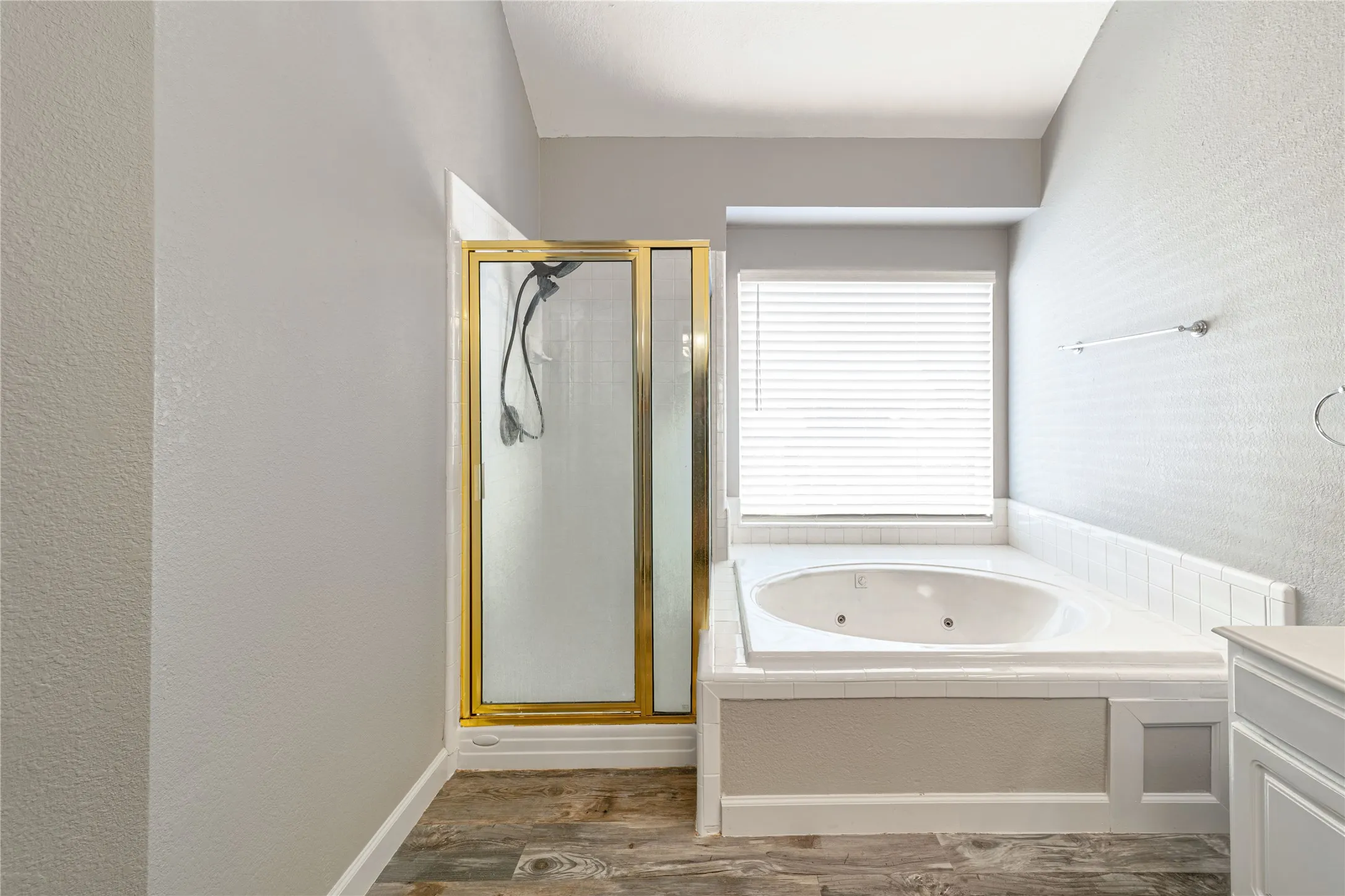 Huge garden tub with a double vanity.