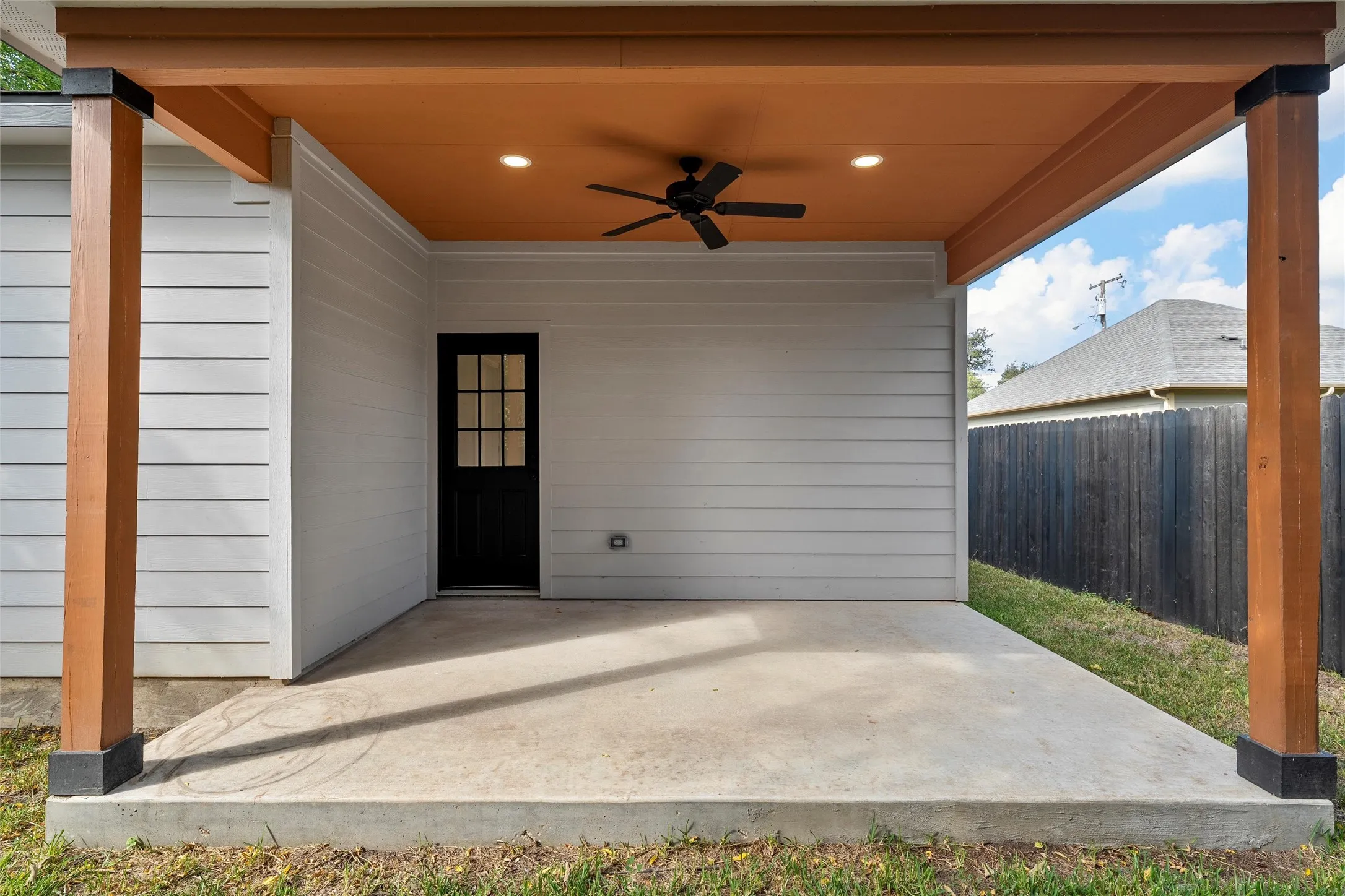 View of patio with ceiling fan