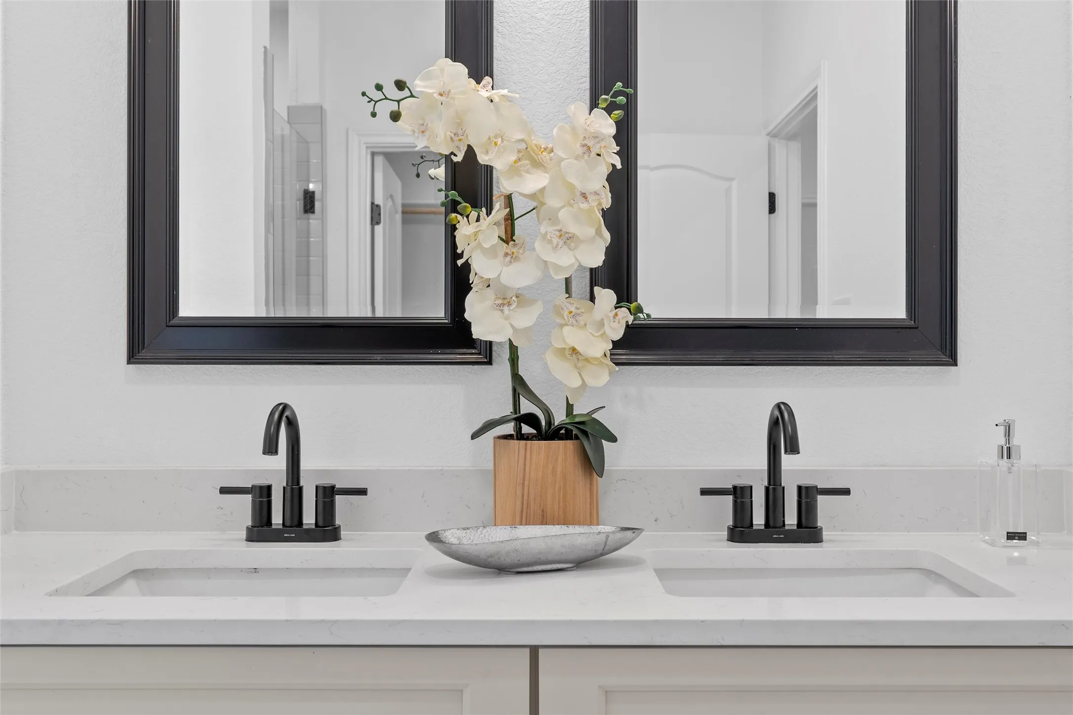 Bathroom featuring double vanity