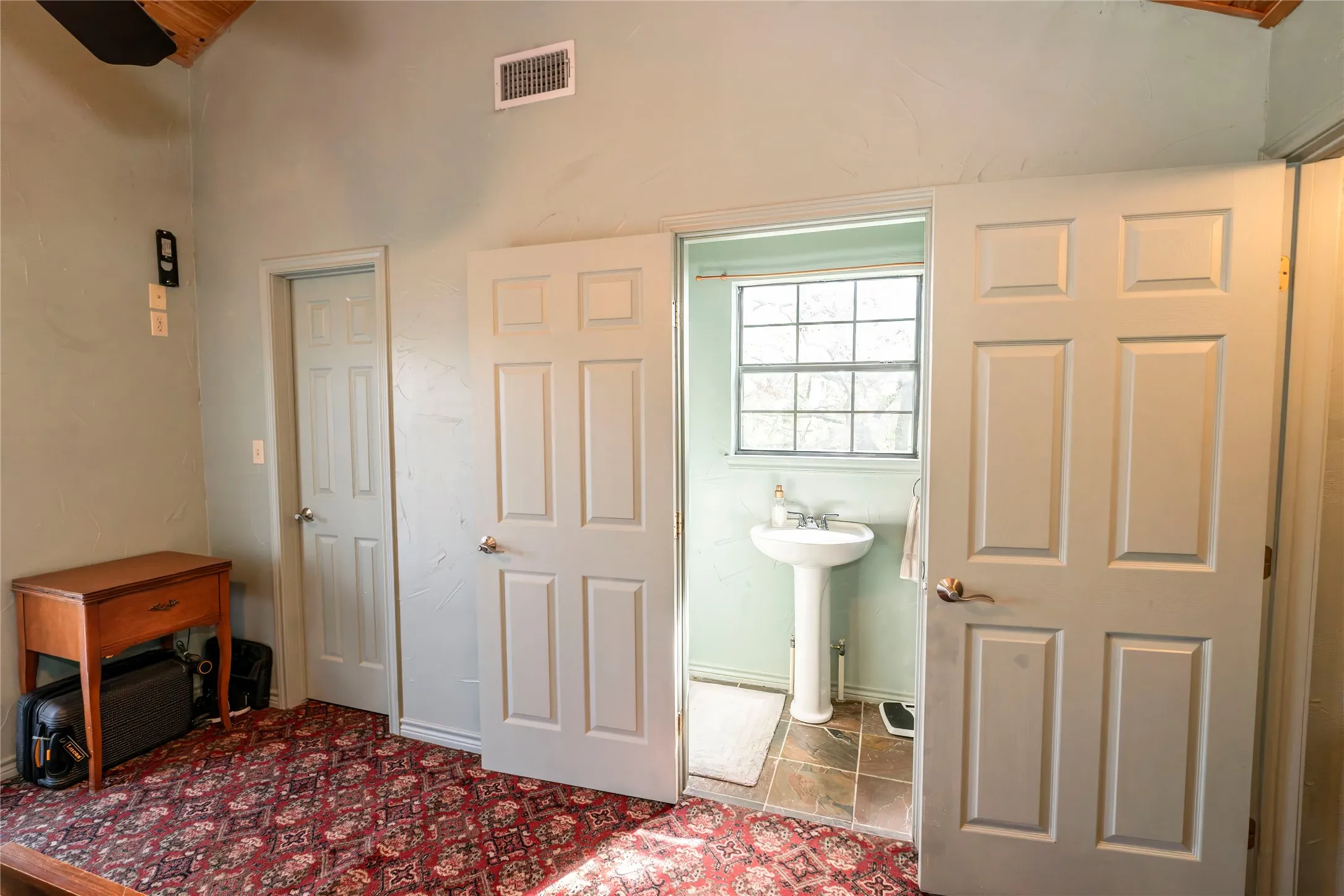 Bedroom with a sink