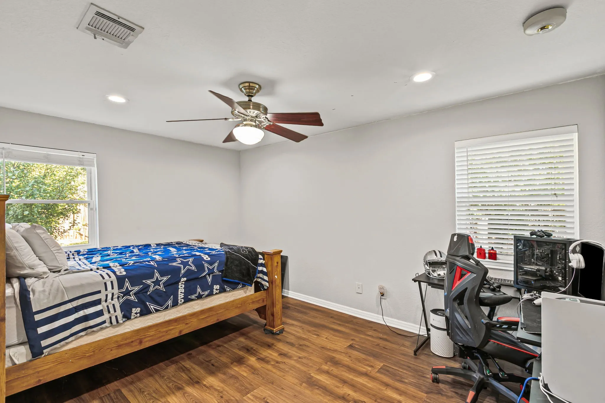 Bedroom featuring dark wood-style floors, a desk, ceiling fan, and recessed lighting