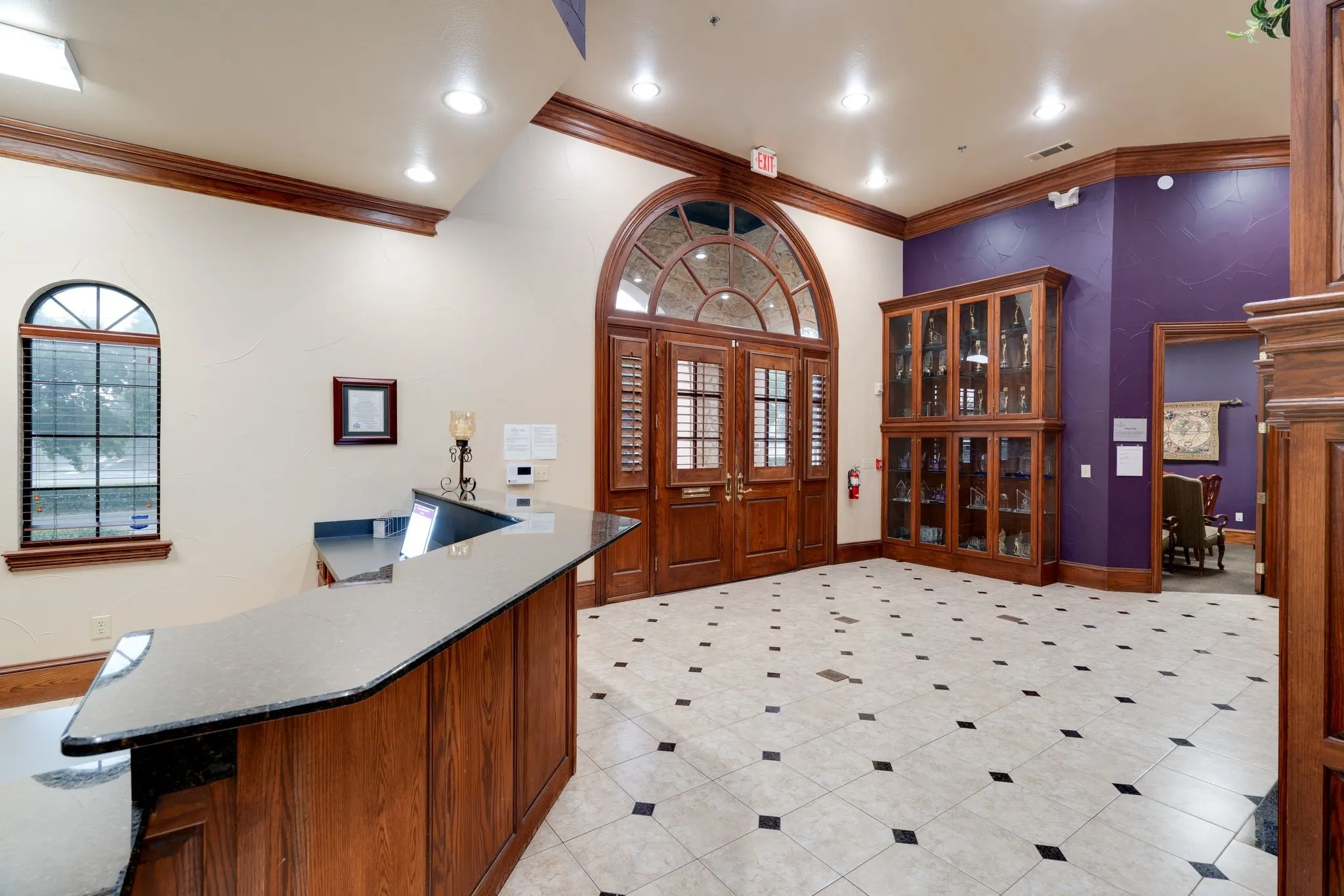 Reception desk and trophy cabinet.