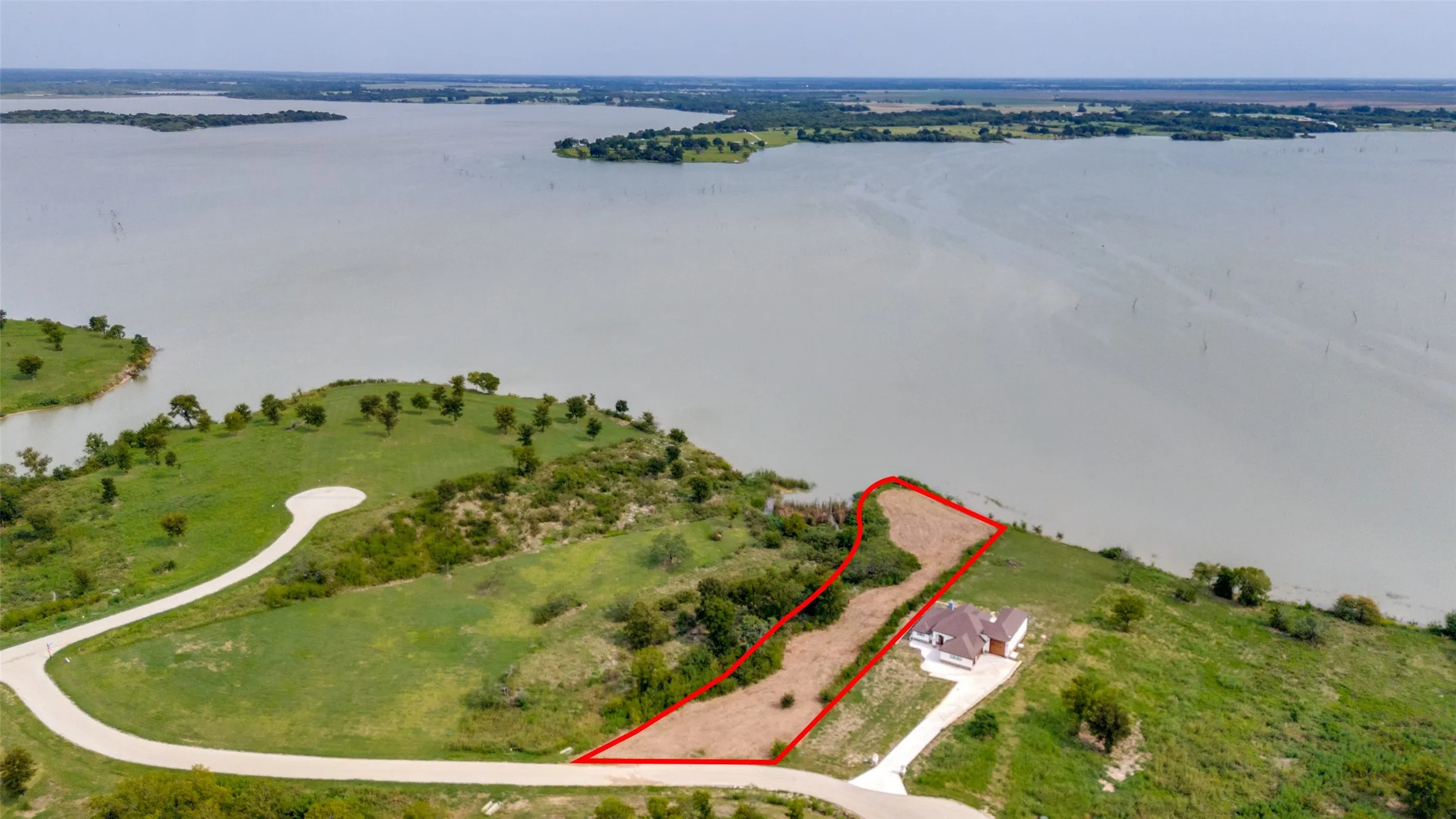 View of property location featuring property boundaries highlighted and a nearby body of​​‌​​​​‌​​‌‌​‌‌​​​‌‌​‌​‌​‌​​​‌​​ water
