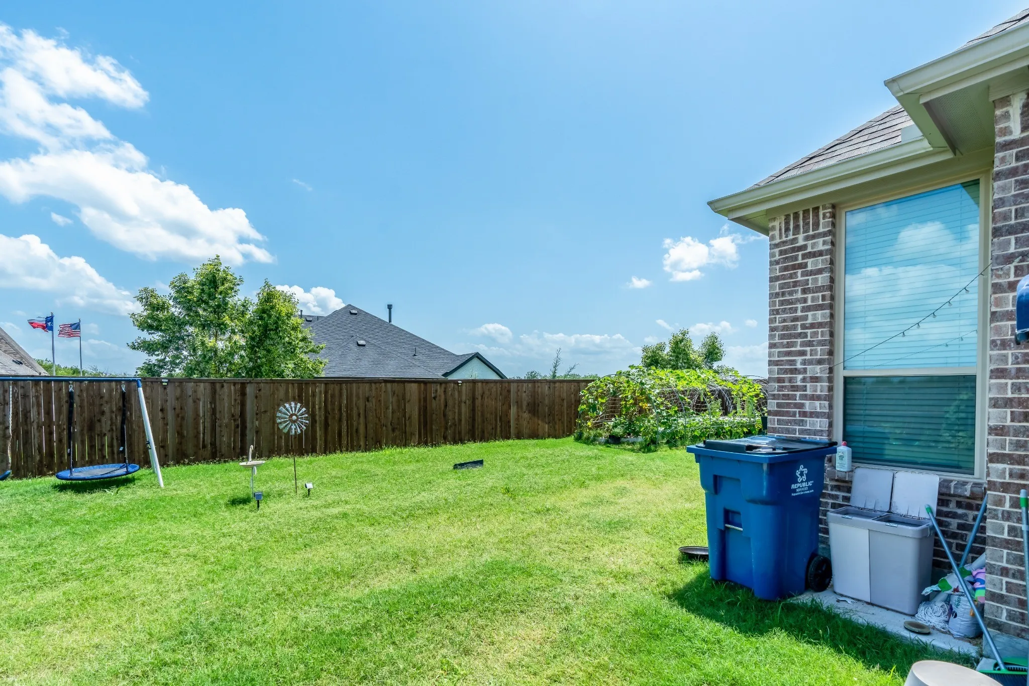 View of fenced backyard