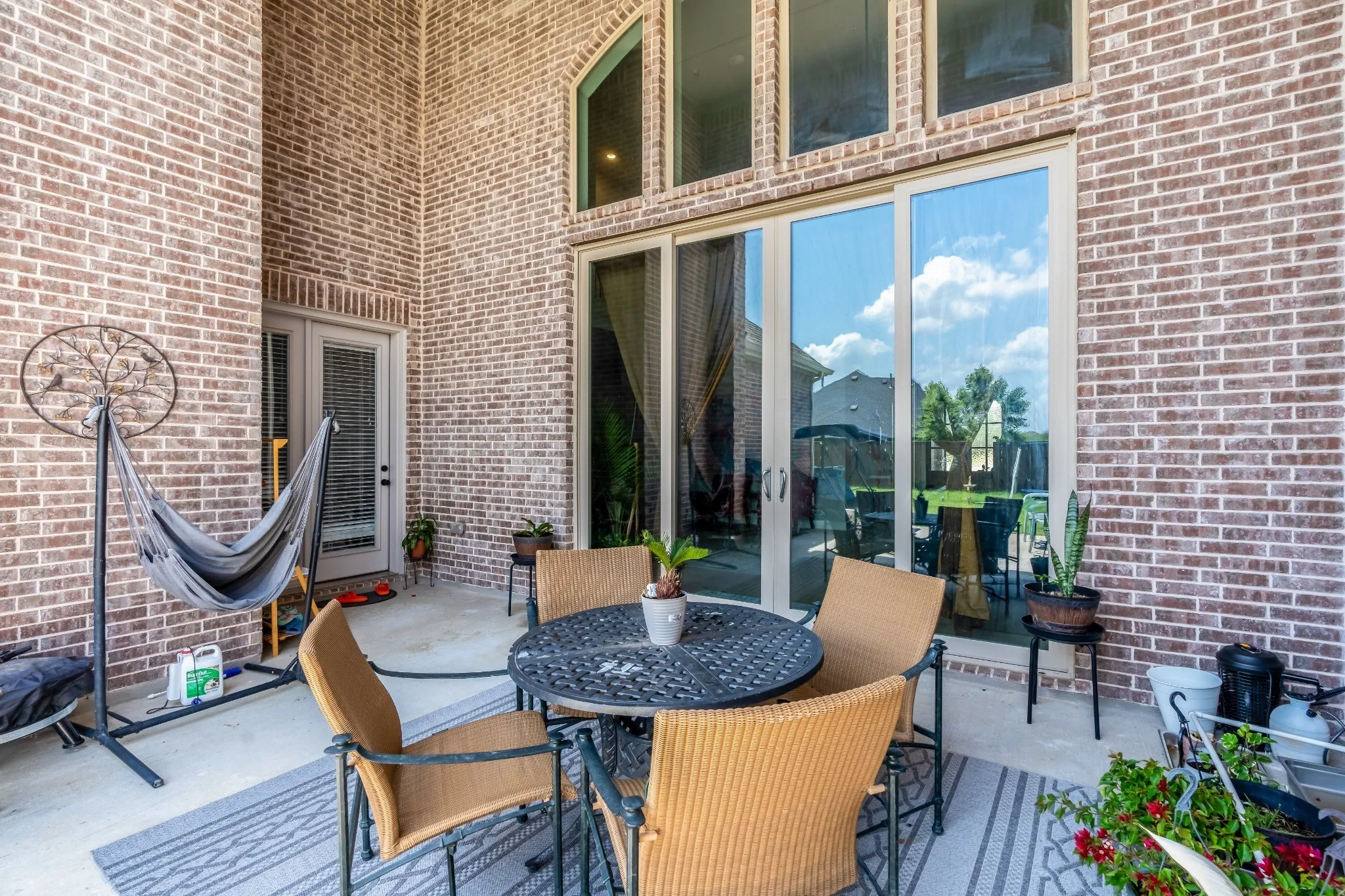 Wooden deck featuring a patio and outdoor dining area