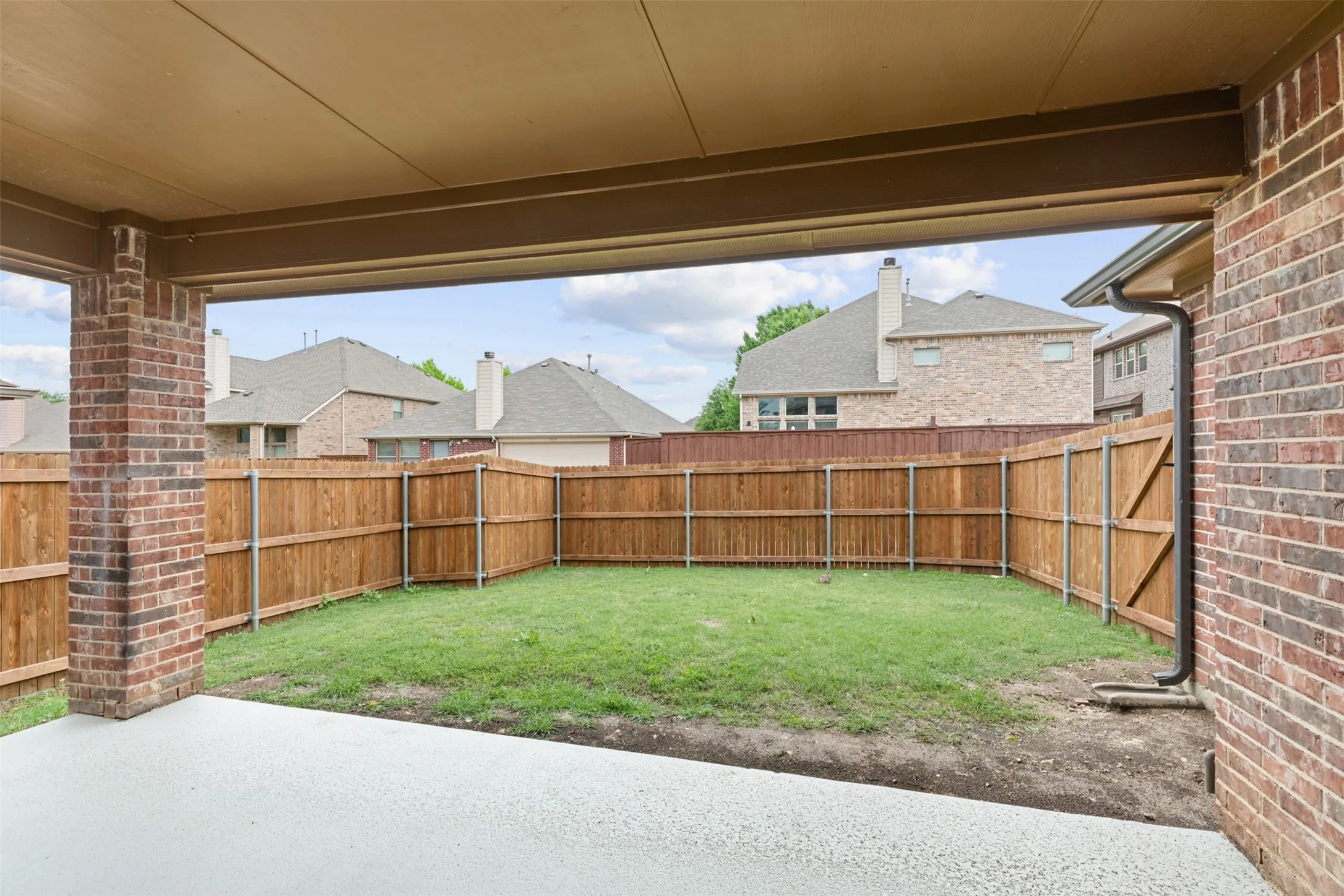 View of yard with a patio and a fenced backyard