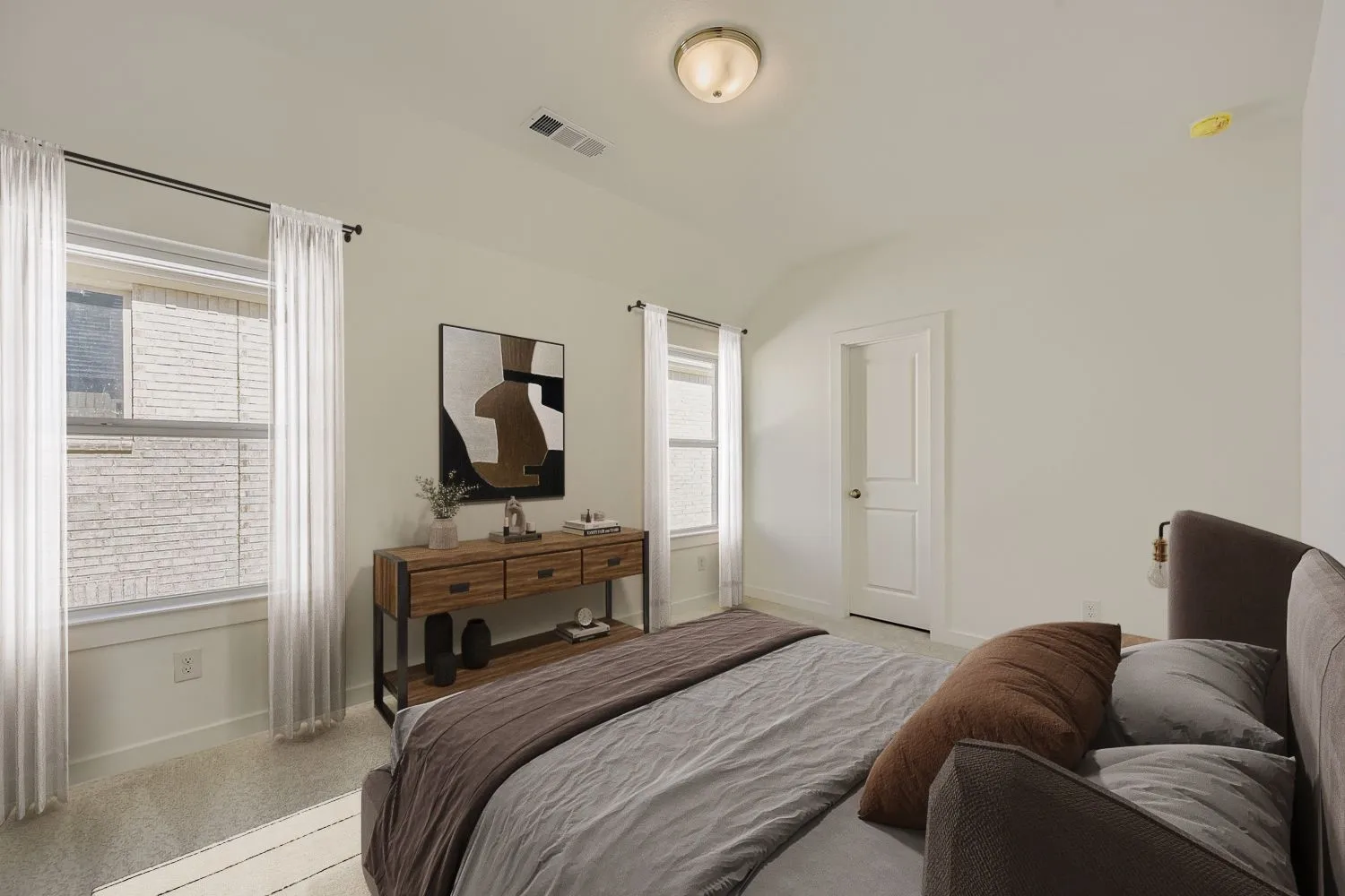 Virtually staged photo - Carpeted room with multiple windows, a paneled door, and a flush-mount ceiling light fixture