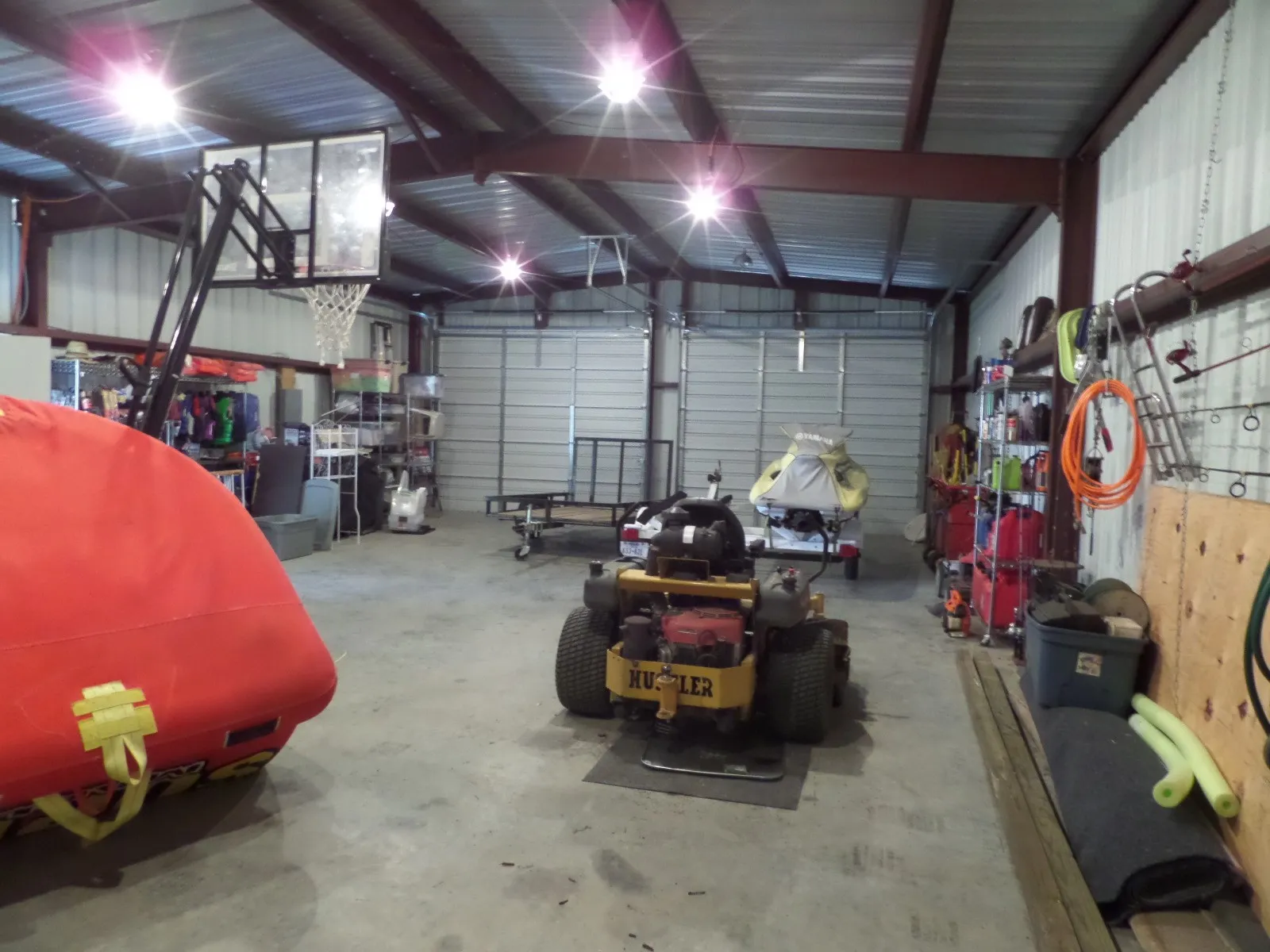 Garage featuring metal wall and heating fuel