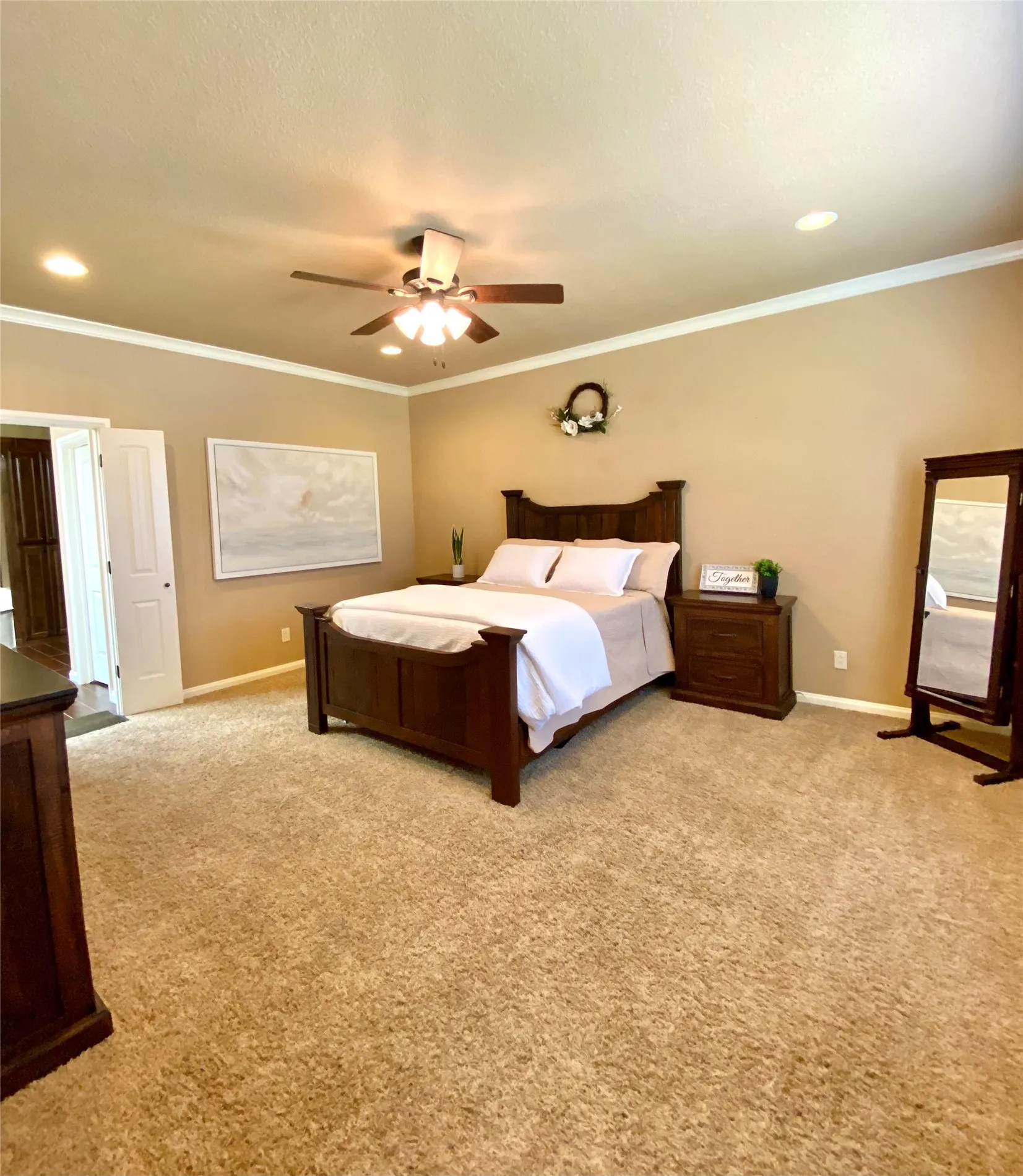 Spacious primary with ensuite, and enough space for sitting area