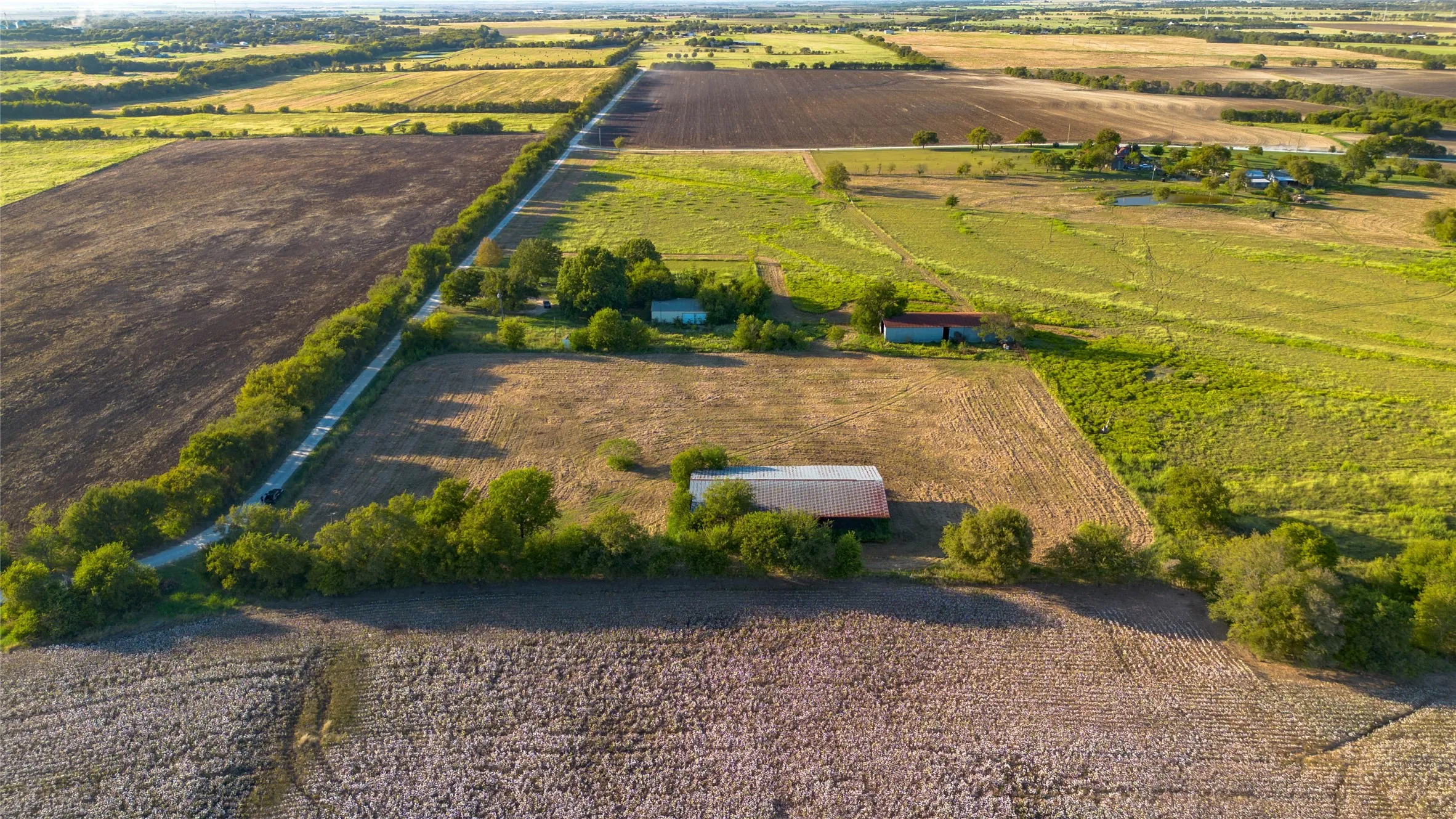 Overview of rural landscape featuring farmland