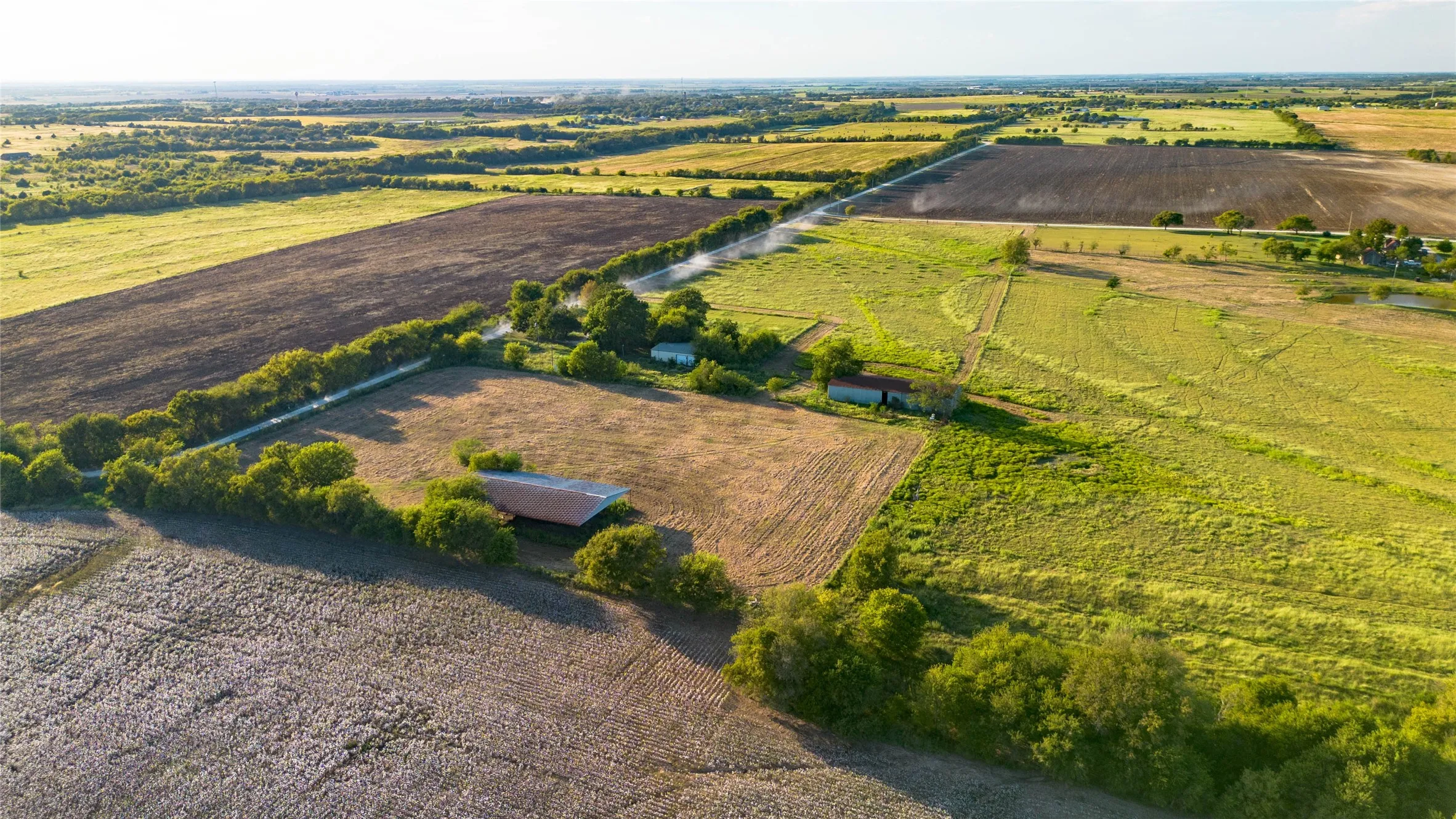 Aerial view of sparsely populated area with abundant farmland