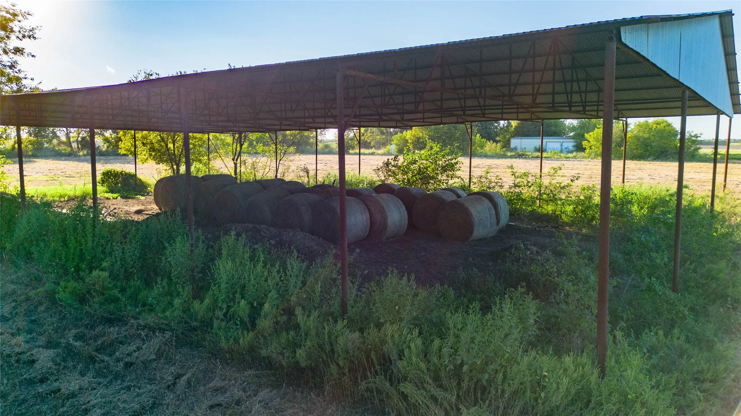 View of vehicle parking with a view of rural / pastoral area