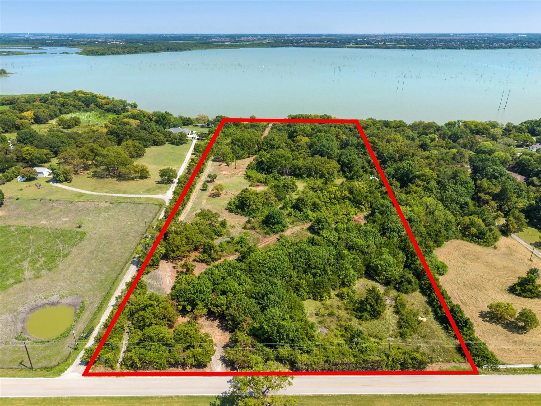 with a large body of water and property parcel outlined