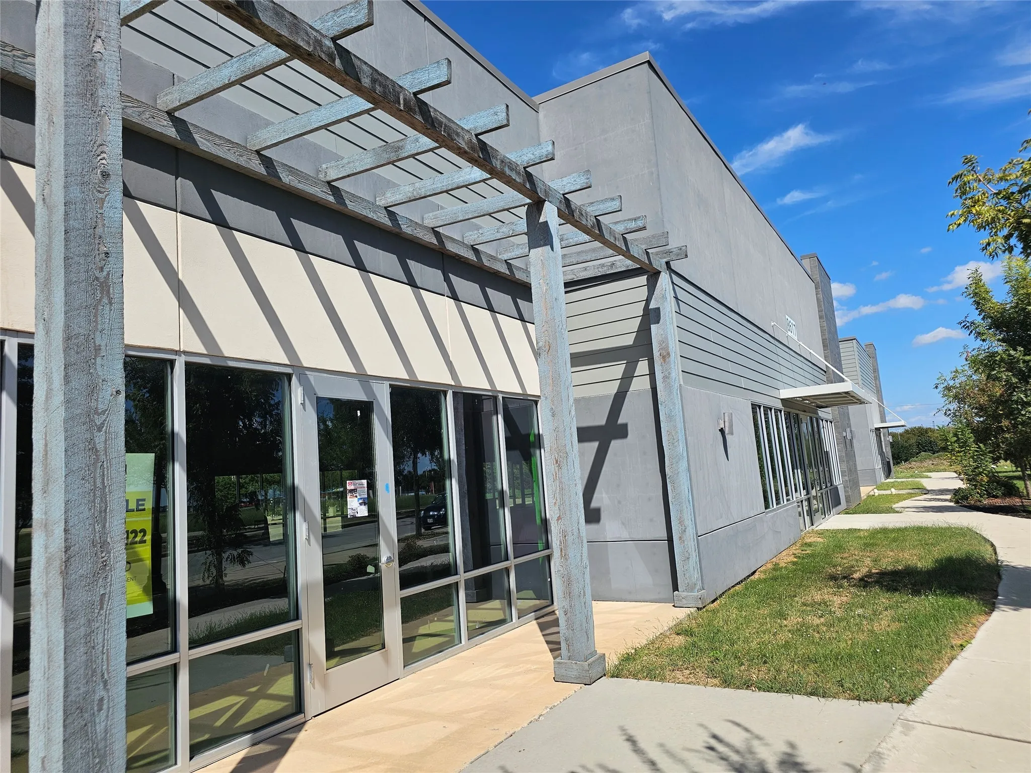 View of exterior entry featuring a pergola