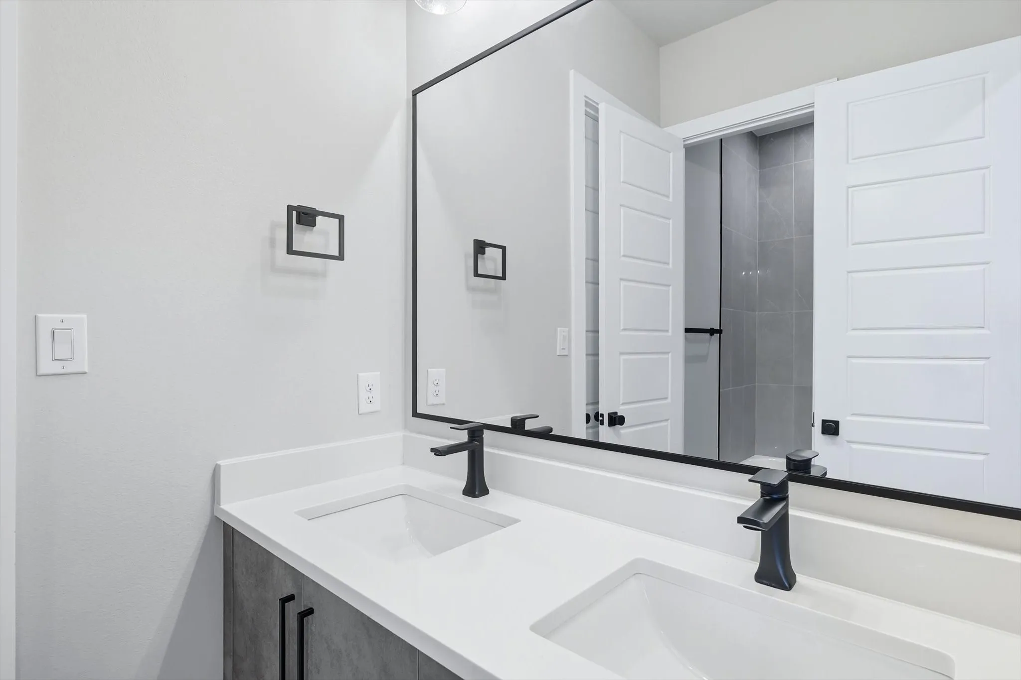 Bathroom featuring double vanity