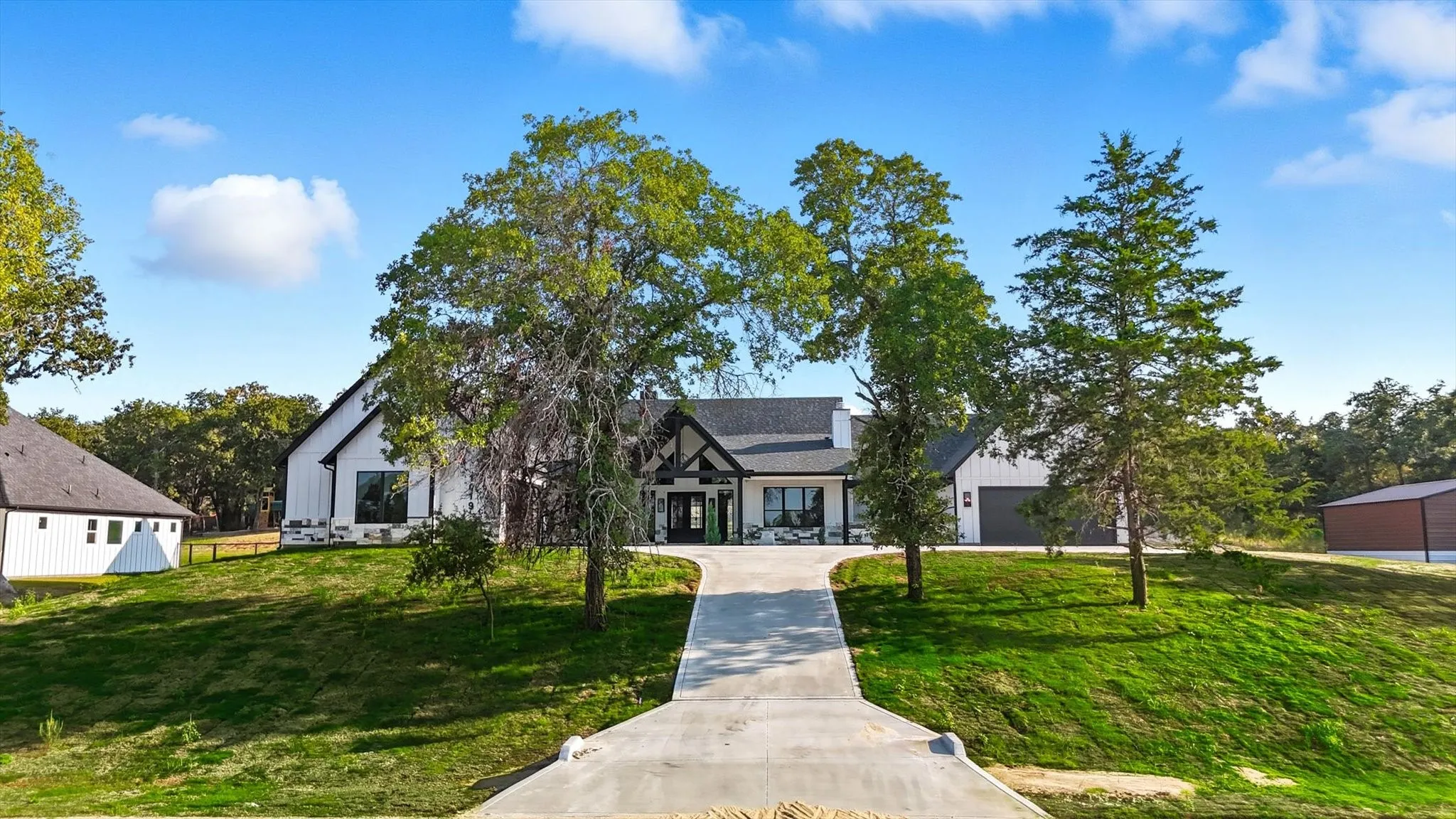 View of front of house with a front lawn and a porch