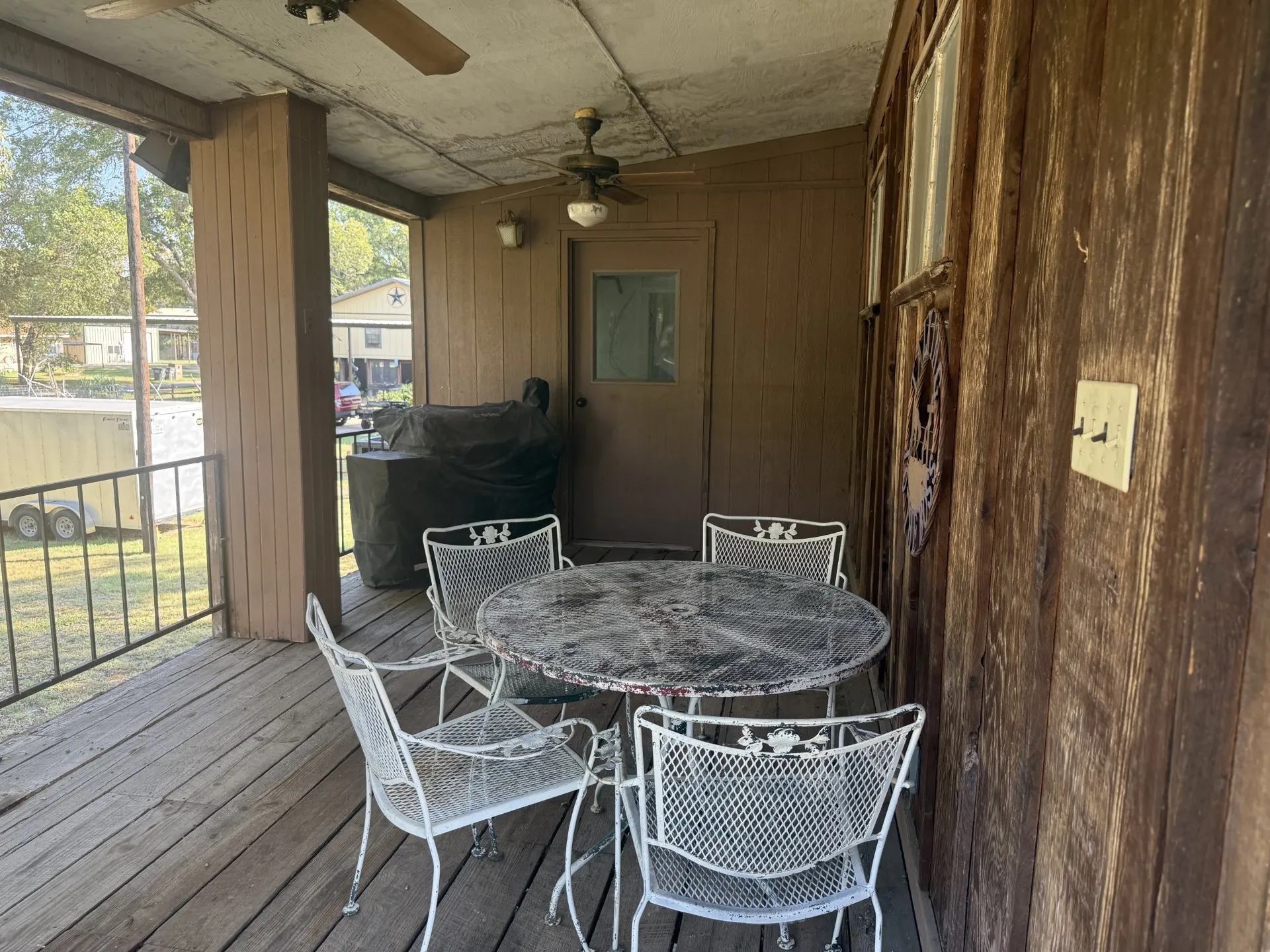 Deck located at back of structure
