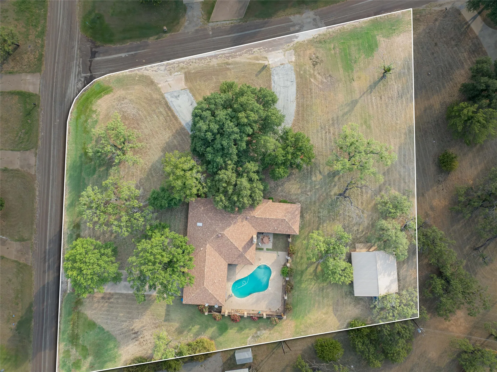 Classic home, 1.3 acre corner lot, additional parking provided with 2 car detached garage with kennel attached.
Kennel offers metal roof, concrete floor and chain link panels.