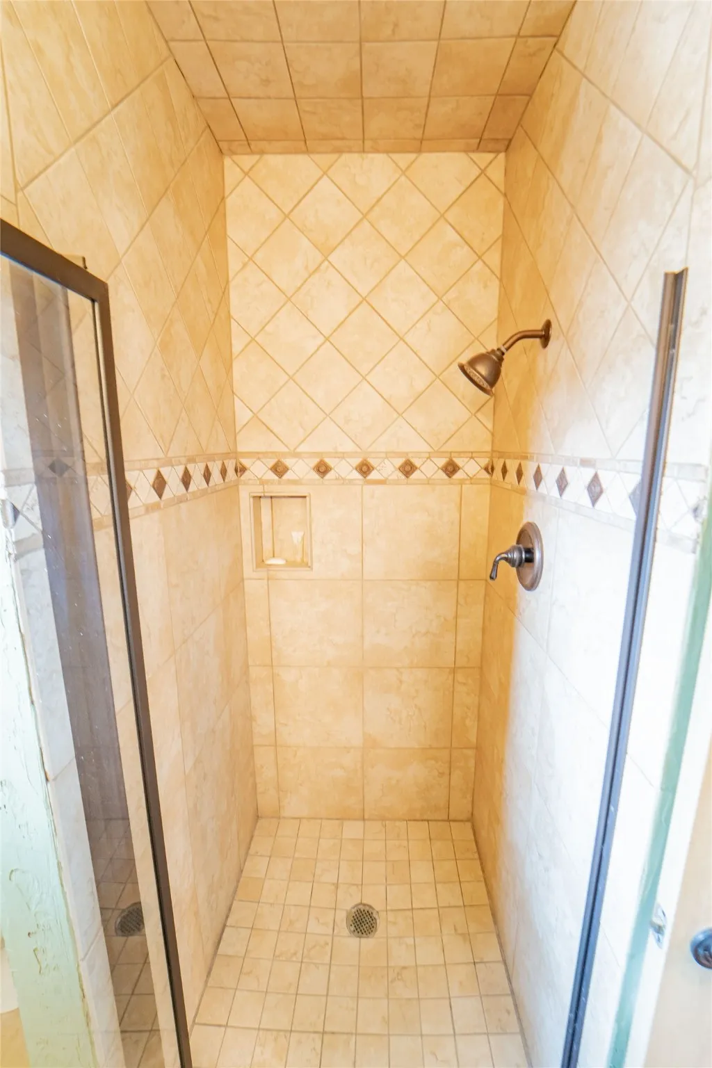 Guest bath#3, custom tiled walk in shower.