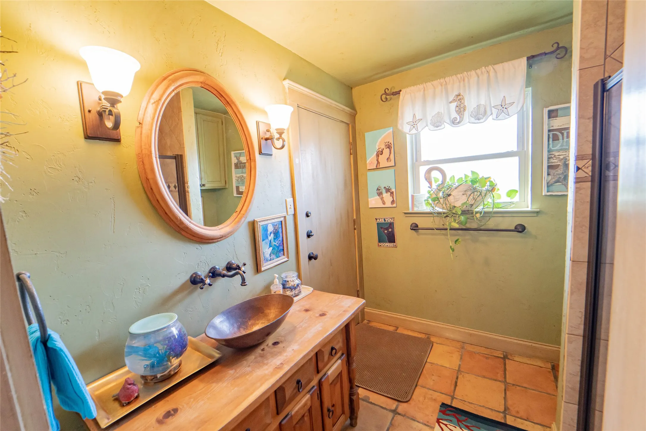 Guest bath#3, located off of bonus room with access to covered patio and pool area.