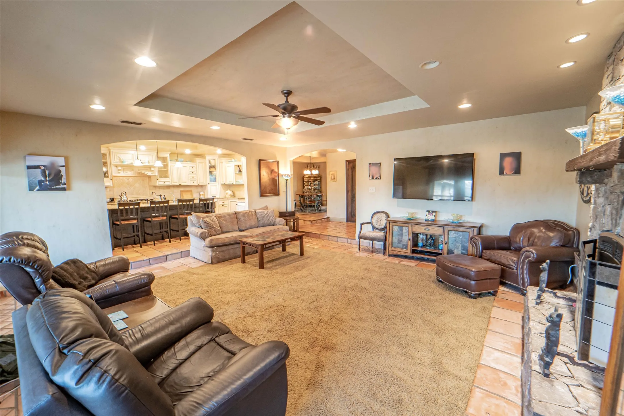 Large and open, the living area offers seamless transition to kitchen and dining.