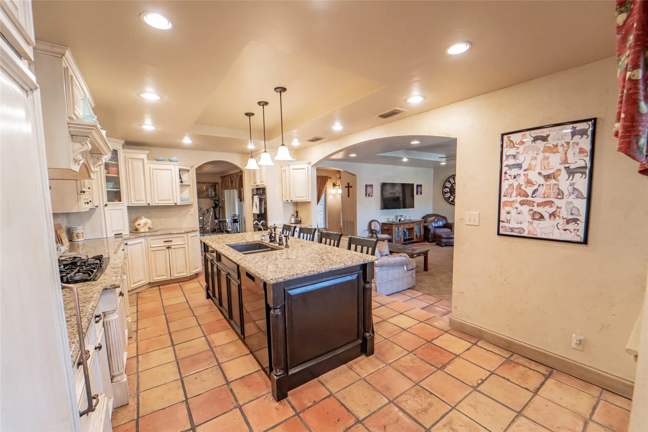 Abundant storage, double ovens, and gas cooktop make this kitchen both stylish and functional!