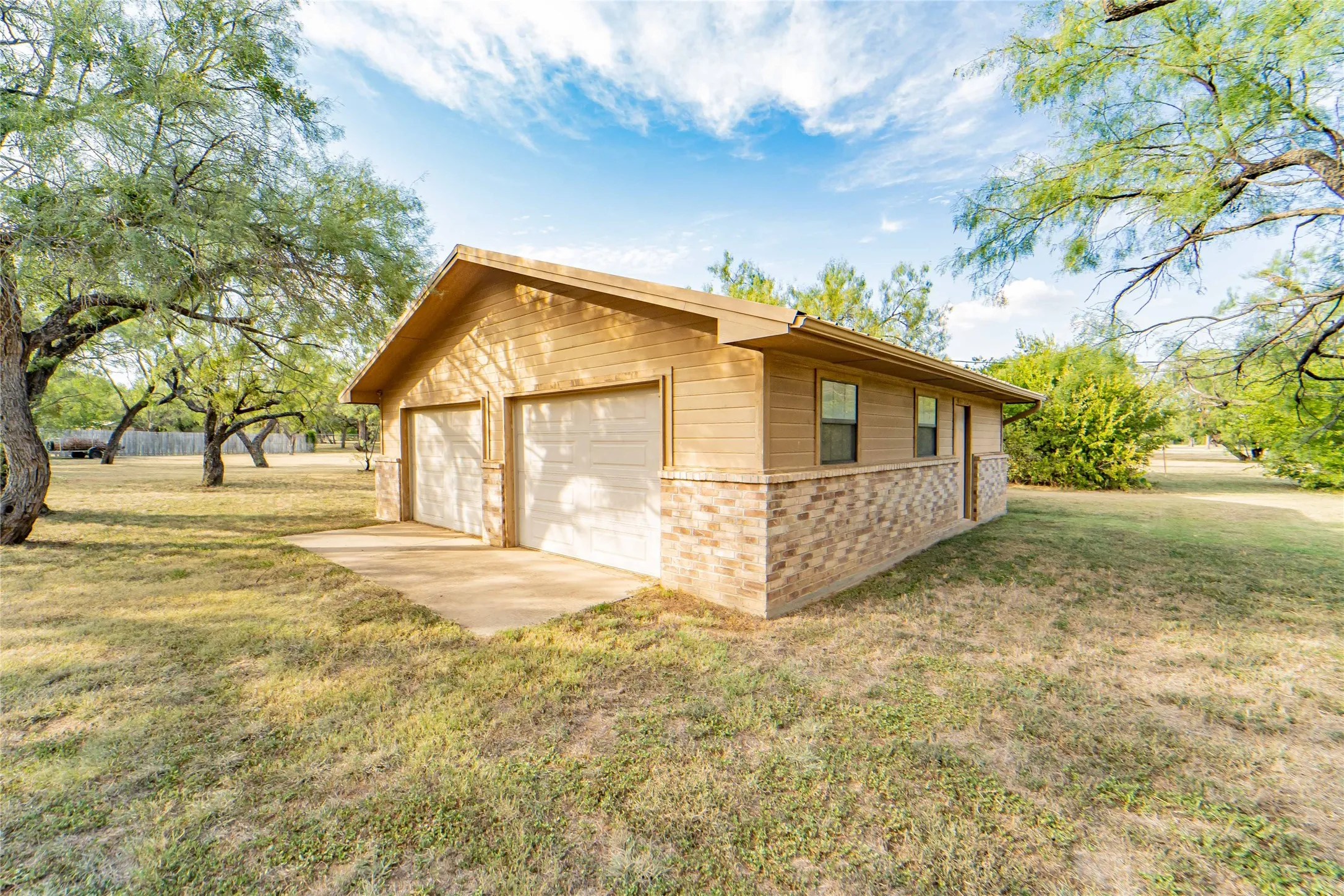 Additional 960 sqft., 2 car detached garage/work shop, (30x32).