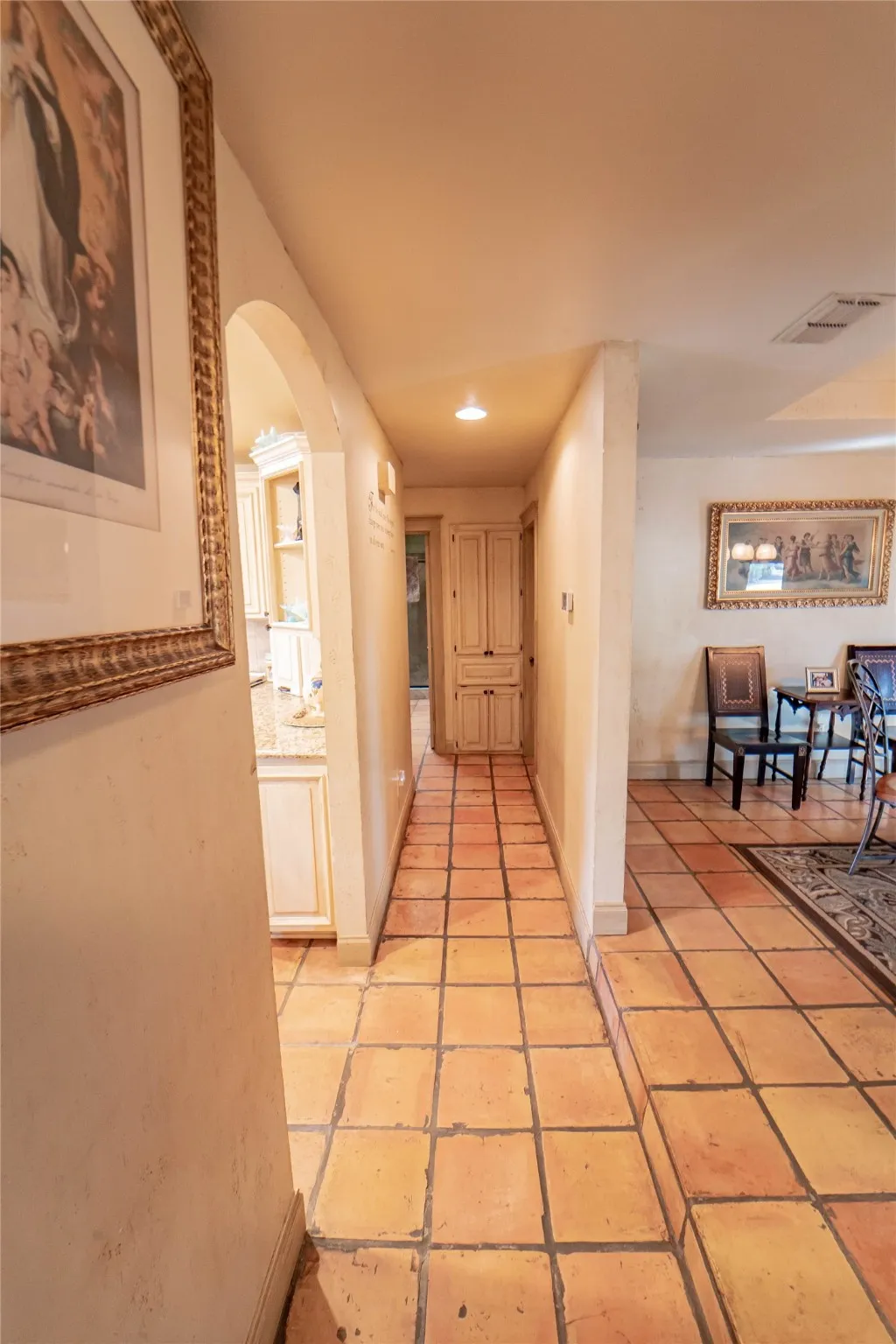 Hallway leading to guest suite offers a split floor plan for added privacy.