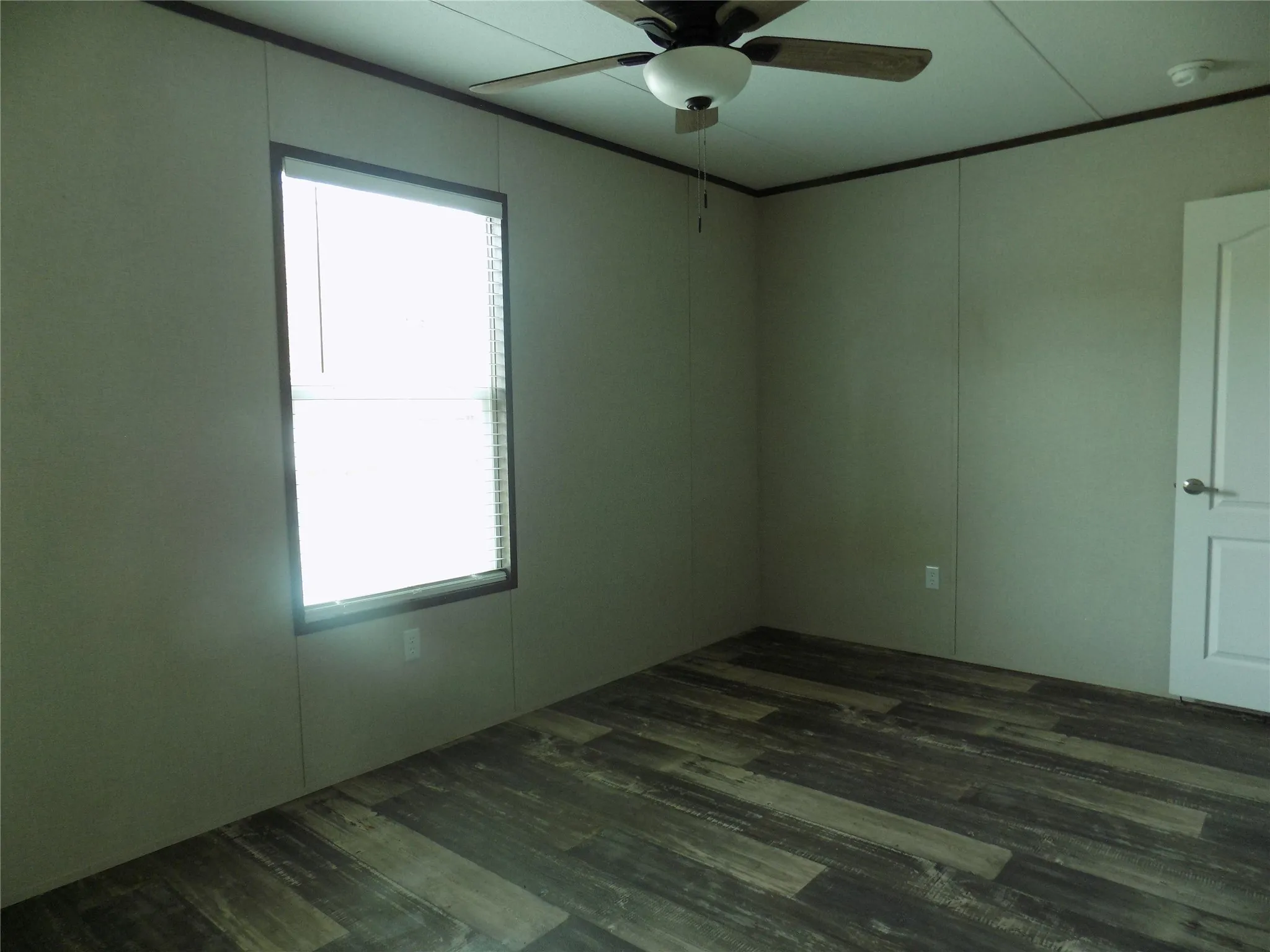Second of two bedrooms off of living room area; nice size.