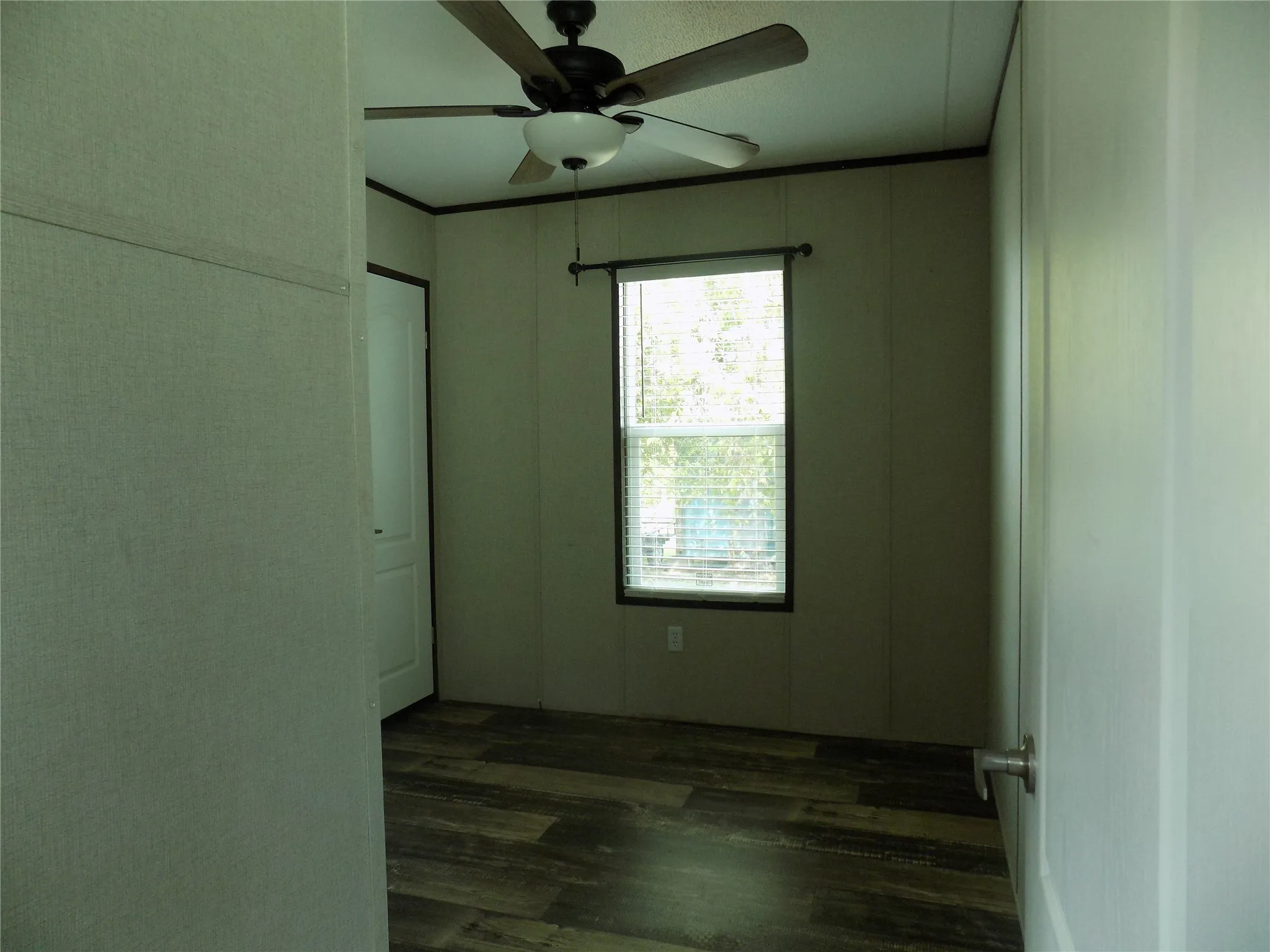 One of two bedrooms, off the living room area.