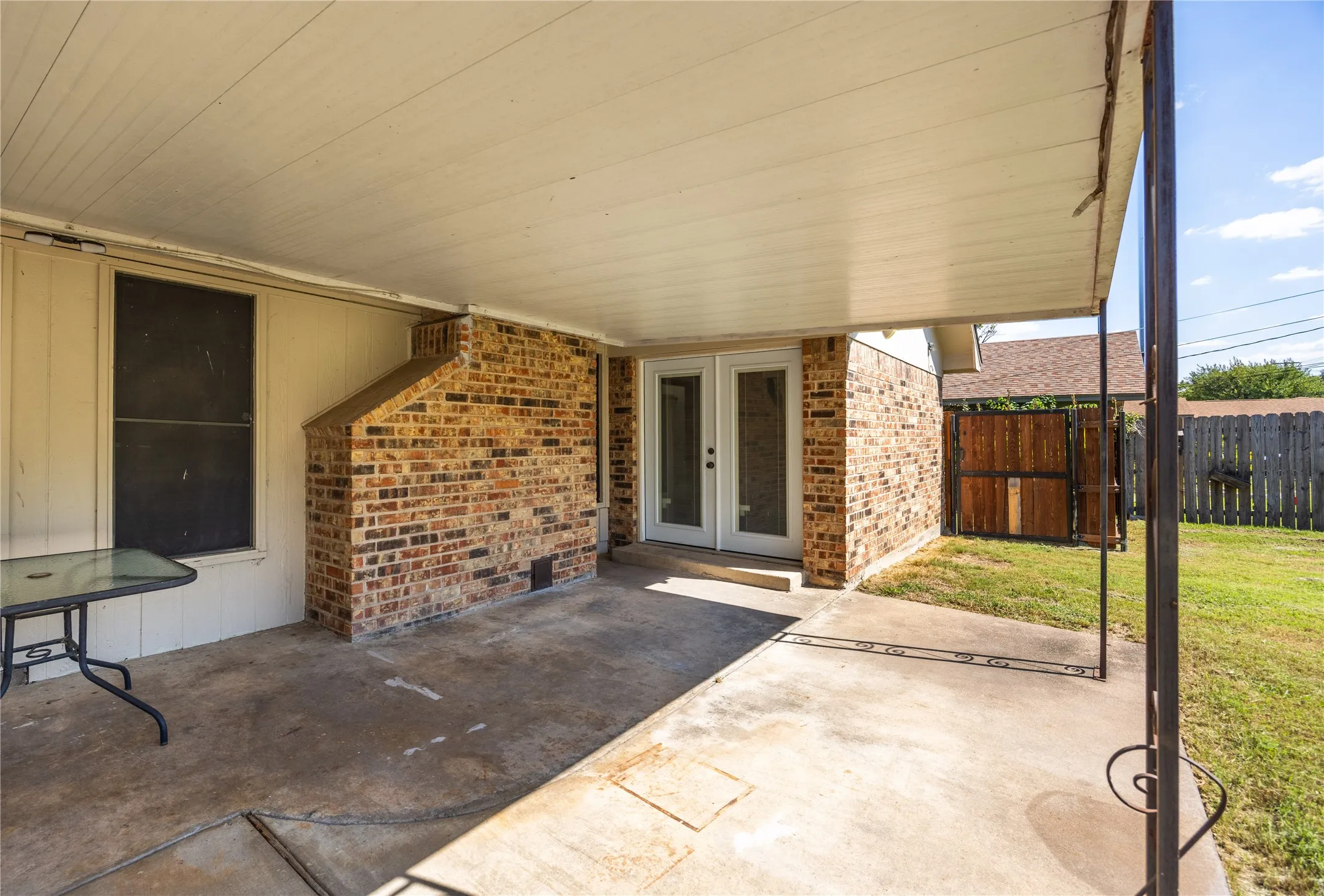 View of patio featuring french doors