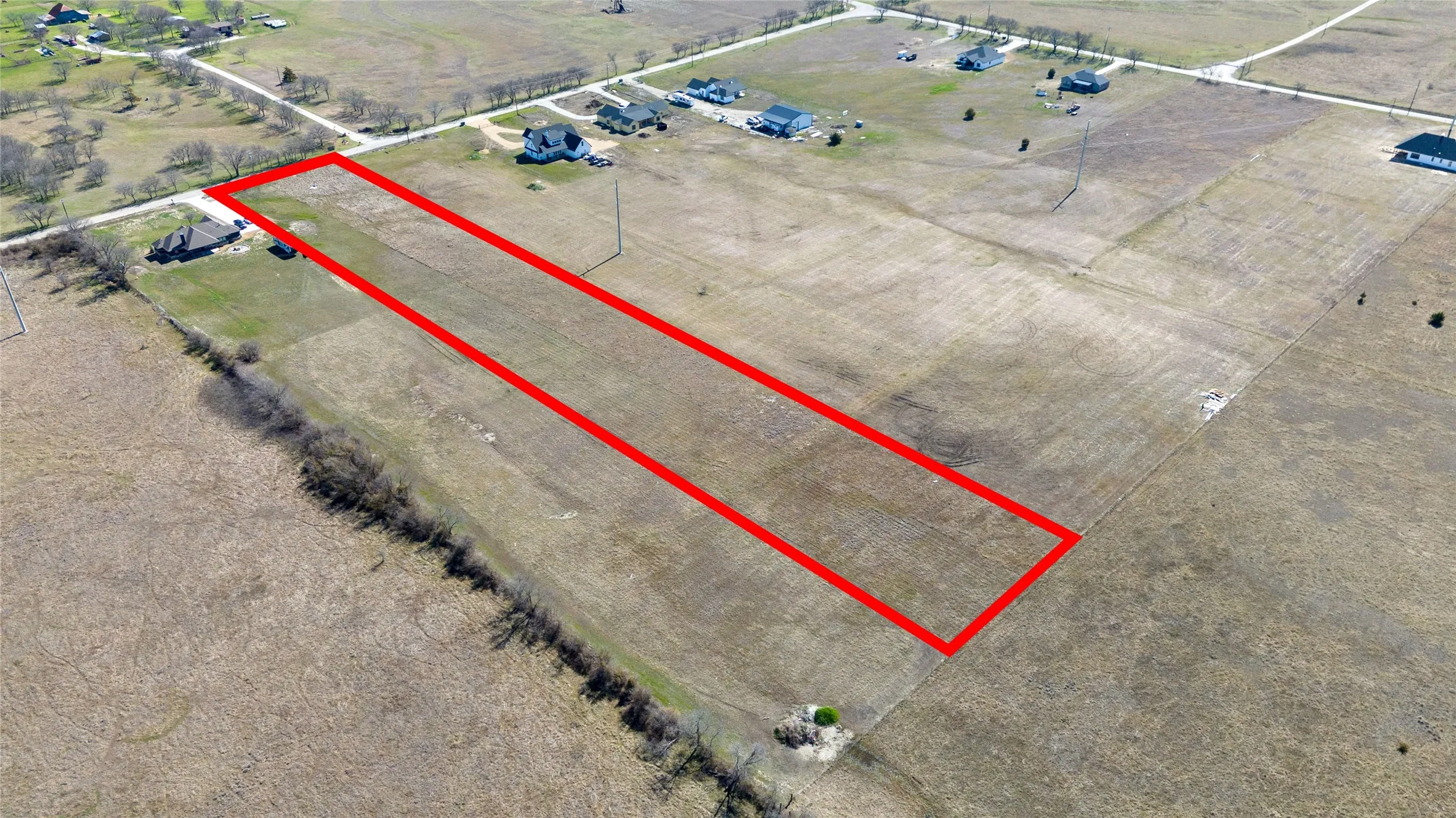 Overview of rural landscape featuring property boundaries highlighted
